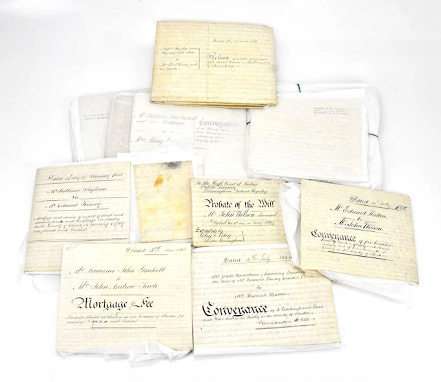 A collection of twelve early 19th century indentures and documents