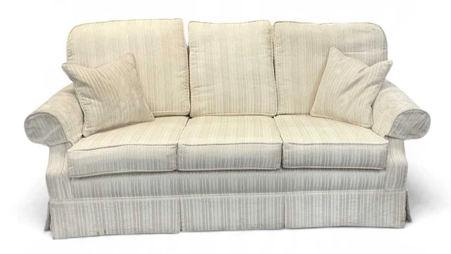 PETER GUILD; a modern contemporary striped cream upholstered two seater sofa