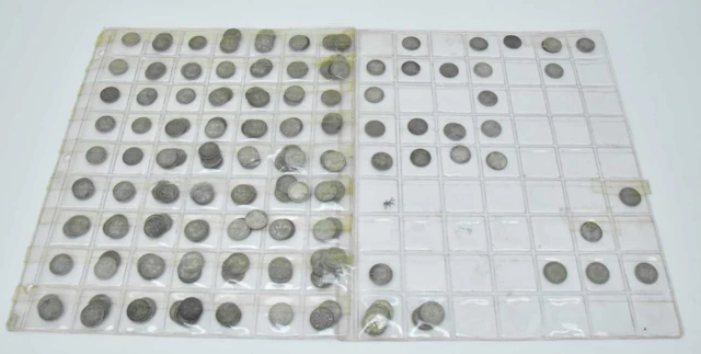Approximately two hundred and three silver and half silver three pence coins