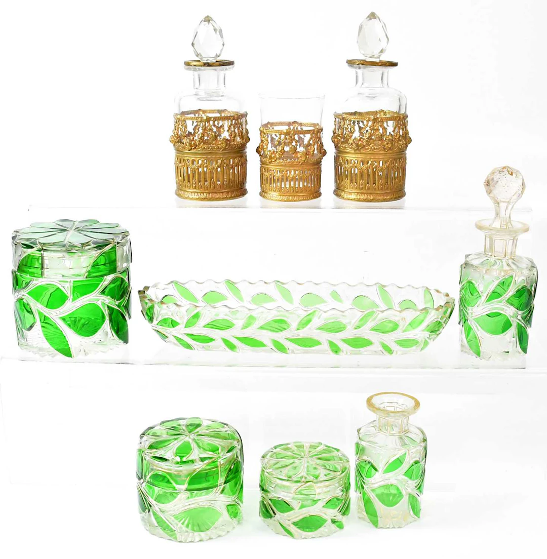 A dressing table set with gilt and green glass decoration