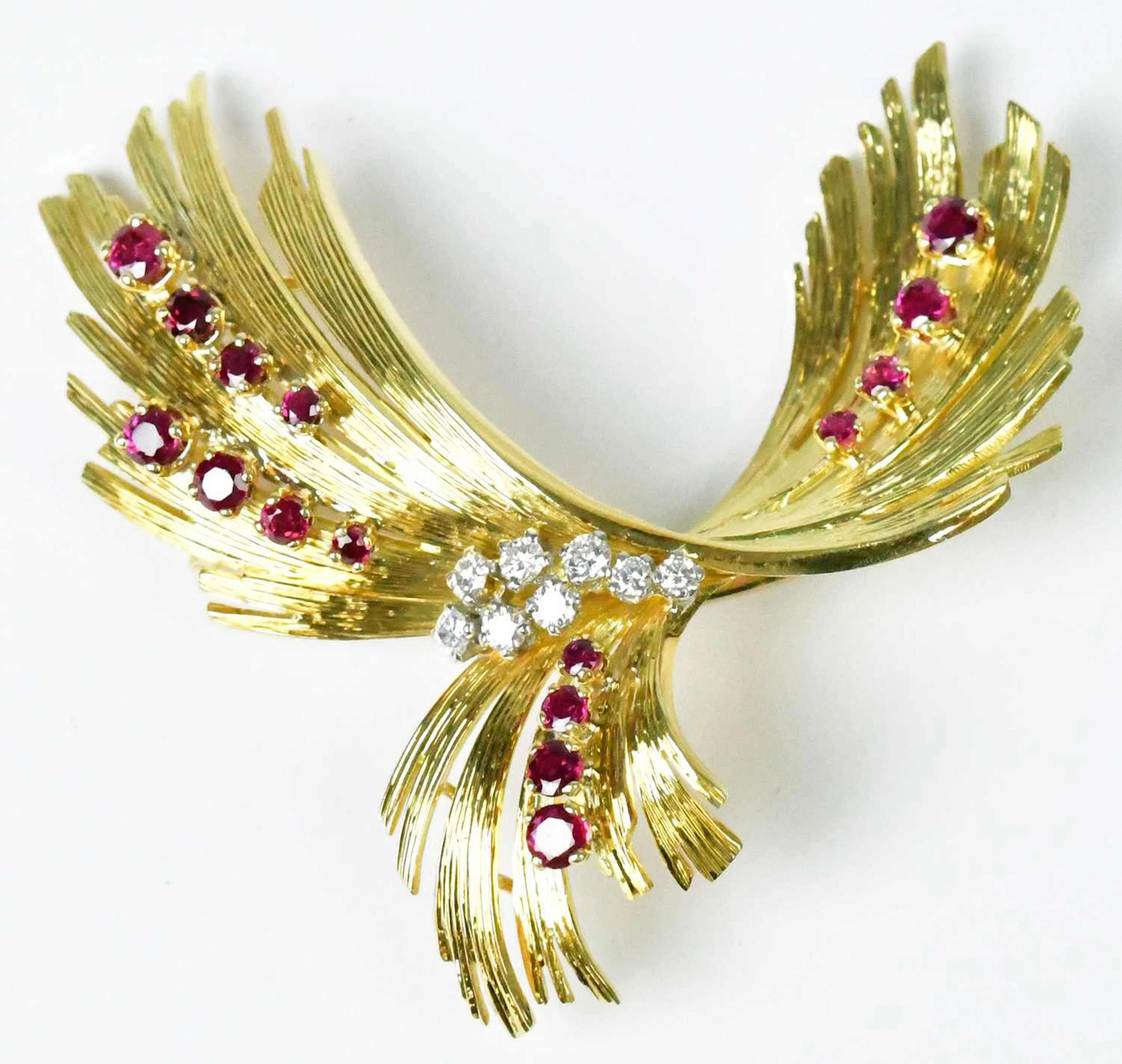 GARRARD & CO; an 18ct yellow gold abstract spray brooch