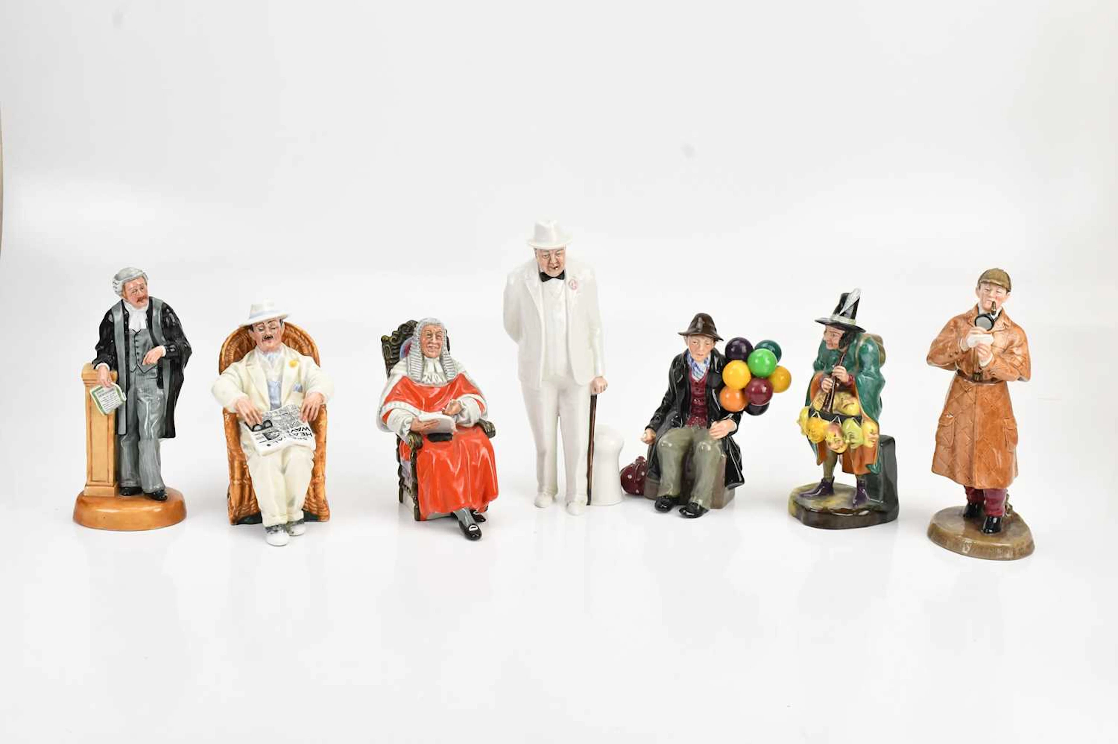 ROYAL DOULTON; seven figures comprising 'Taking Things Easy'
