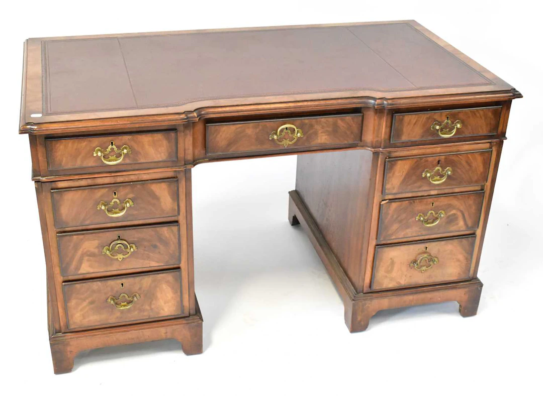 A George III style mahogany pedestal desk