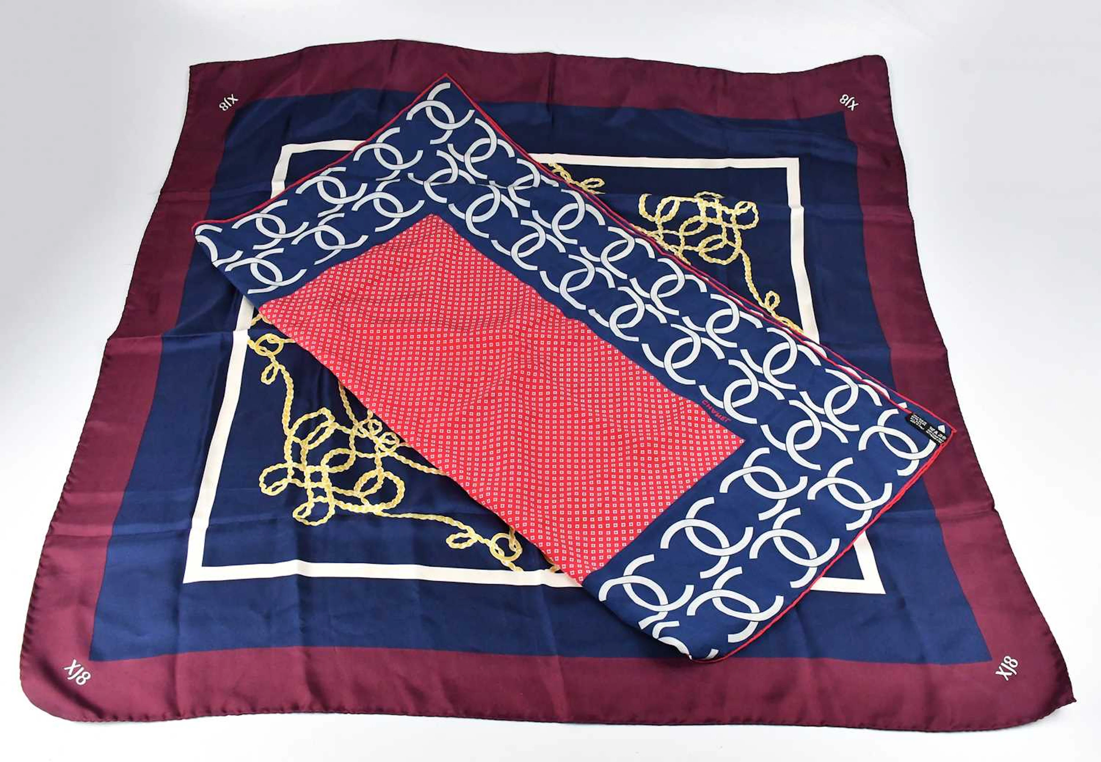 CHANEL; a 100% twill silk red
