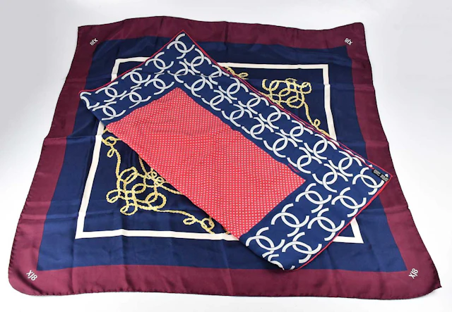 CHANEL; a 100% twill silk red