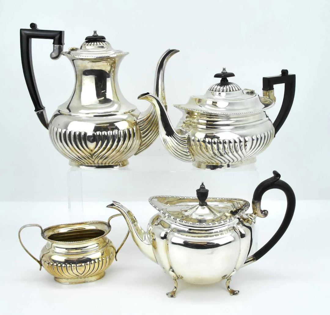 A four-piece mixed silver-plated tea service comprising...