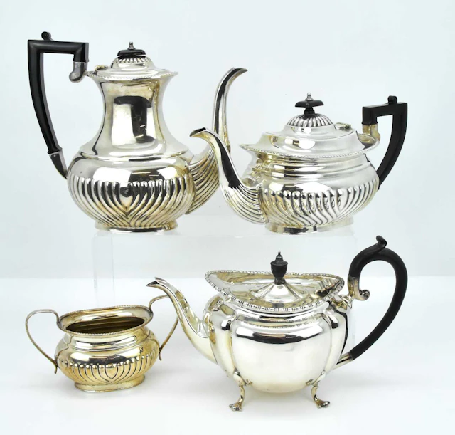 A four-piece mixed silver-plated tea service comprising...