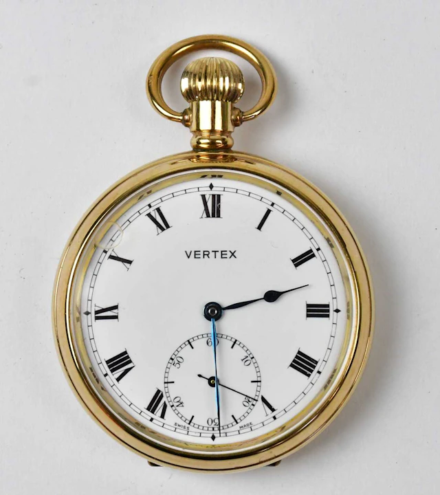 VERTEX; a gold-plated open face crown wind pocklet watch