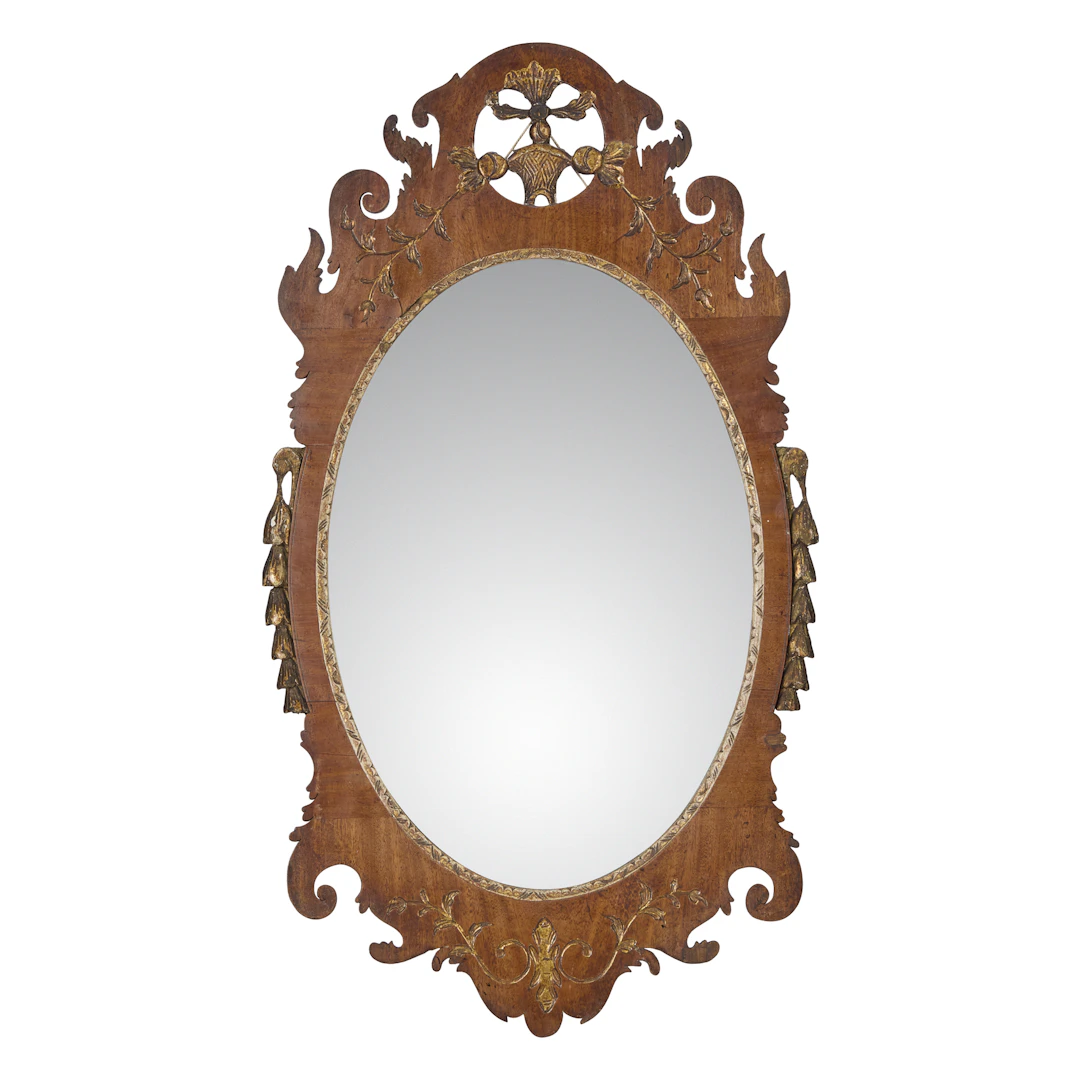 IRISH GEORGE III MAHOGANY AND PARCEL-GILT OVAL MIRROR