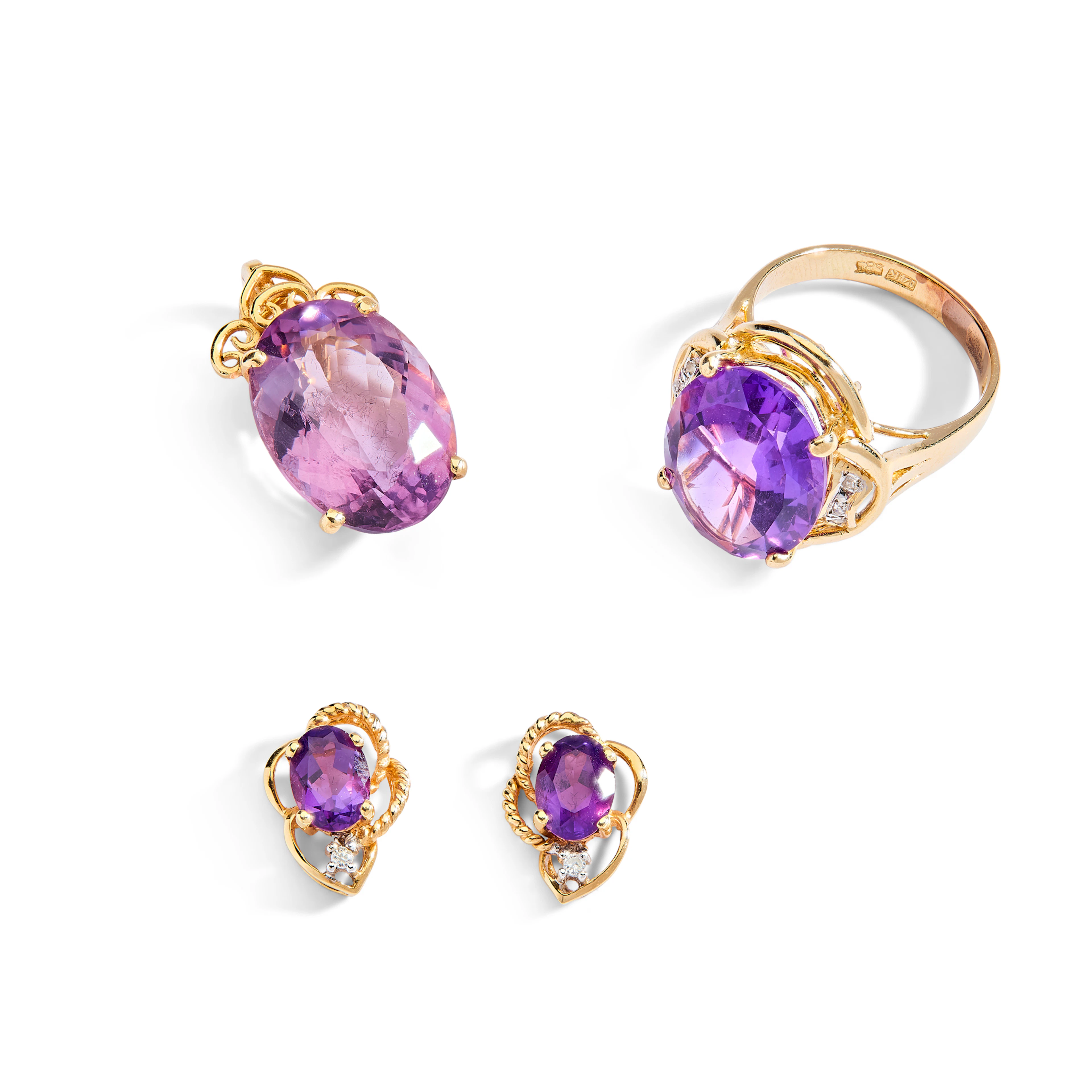 A suite of amethyst and diamond jewellery