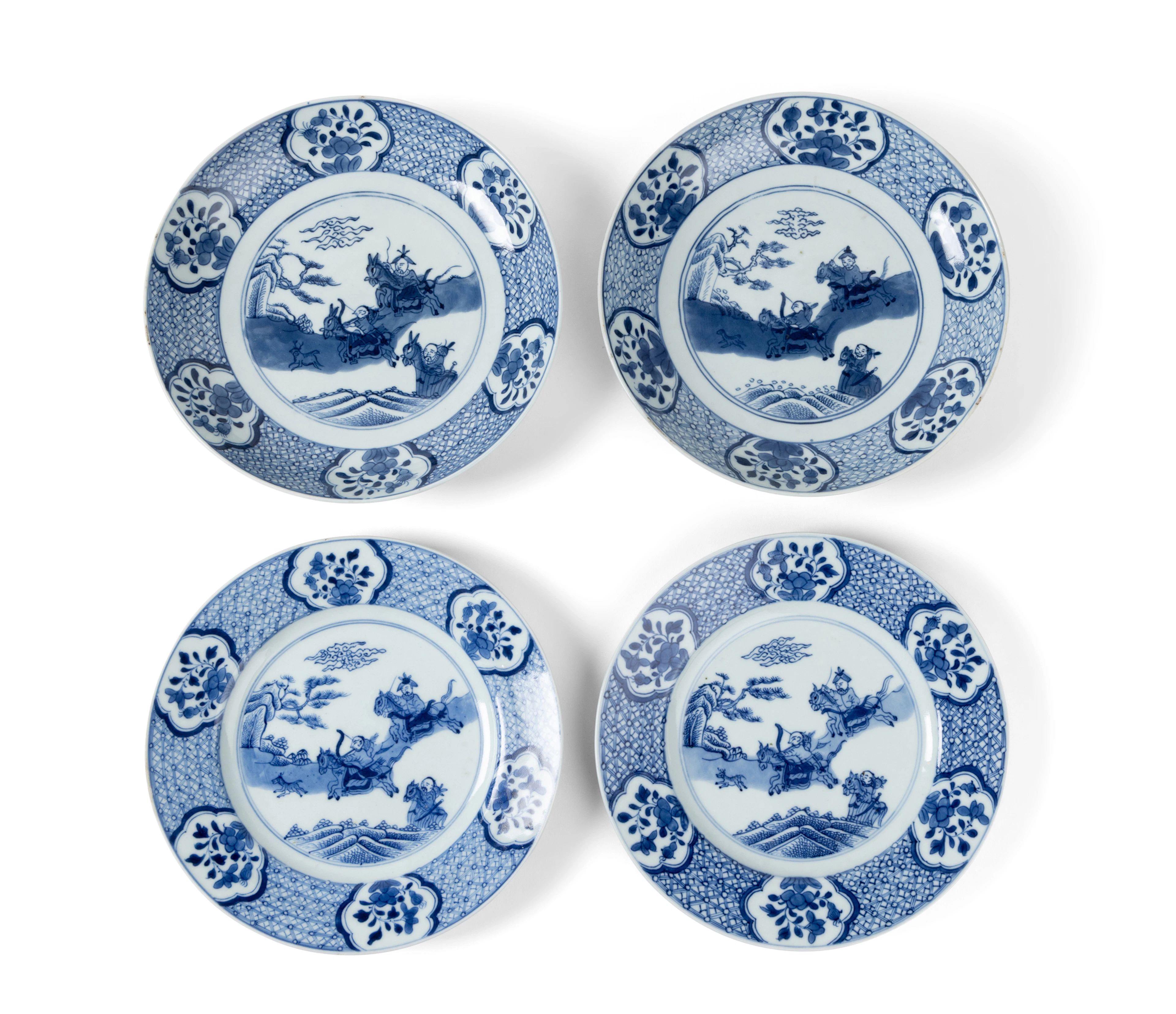GROUP OF FOUR CHINESE BLUE AND WHITE 'HUNTING SCENE' PLATES AND DISHES