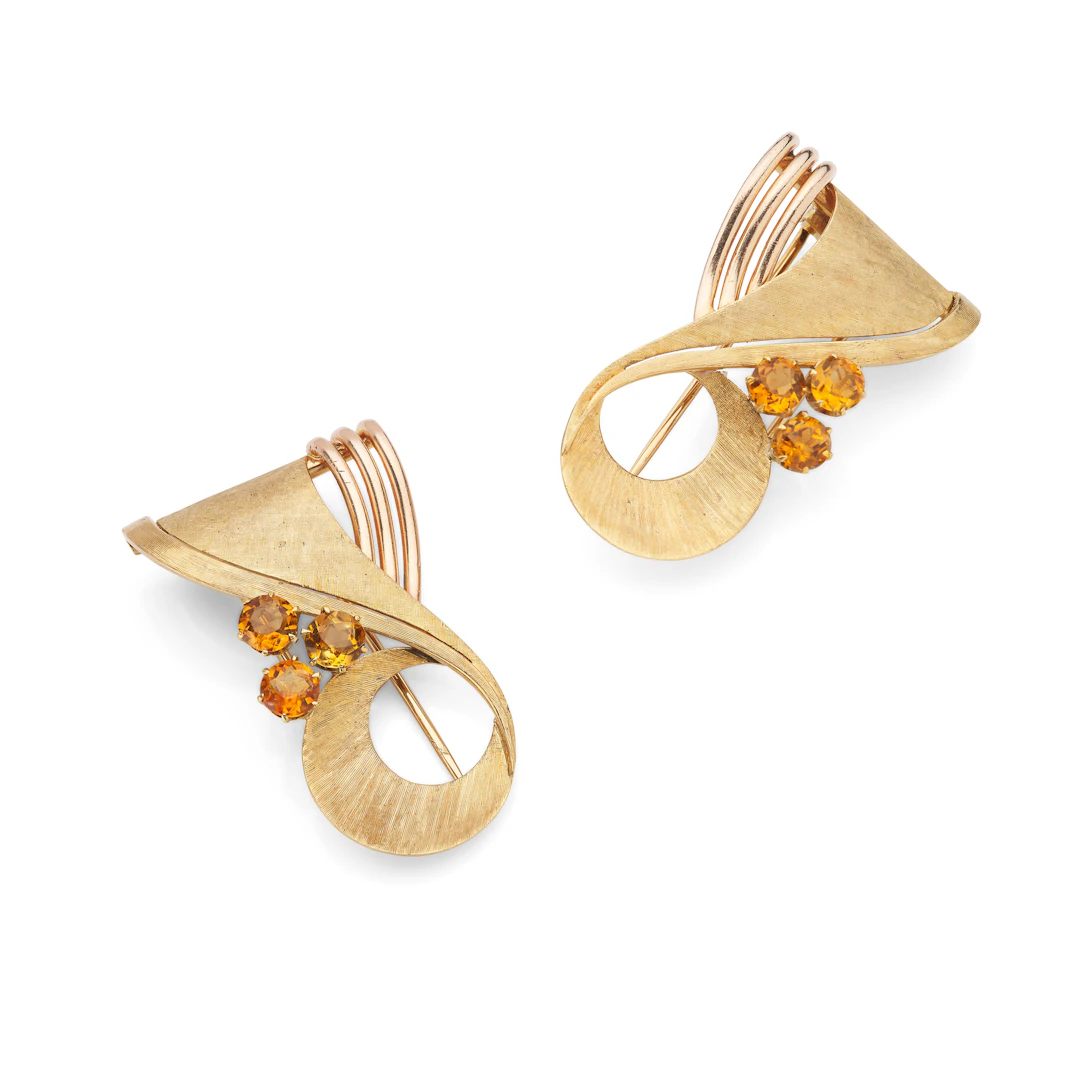 A pair of citrine clip brooches, circa 1955
