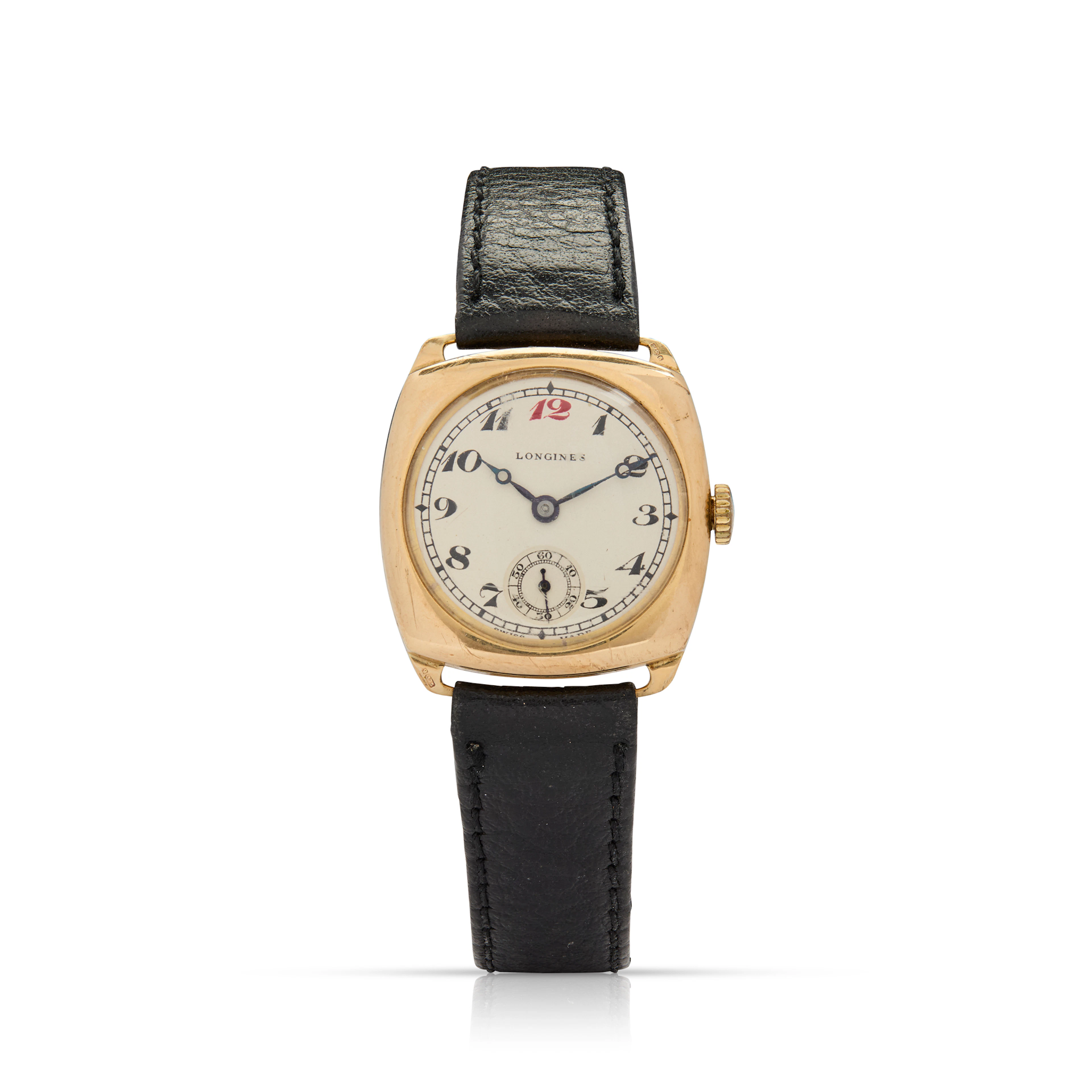 Longines. A 9k gold cushion-shape mechanical wristwatch