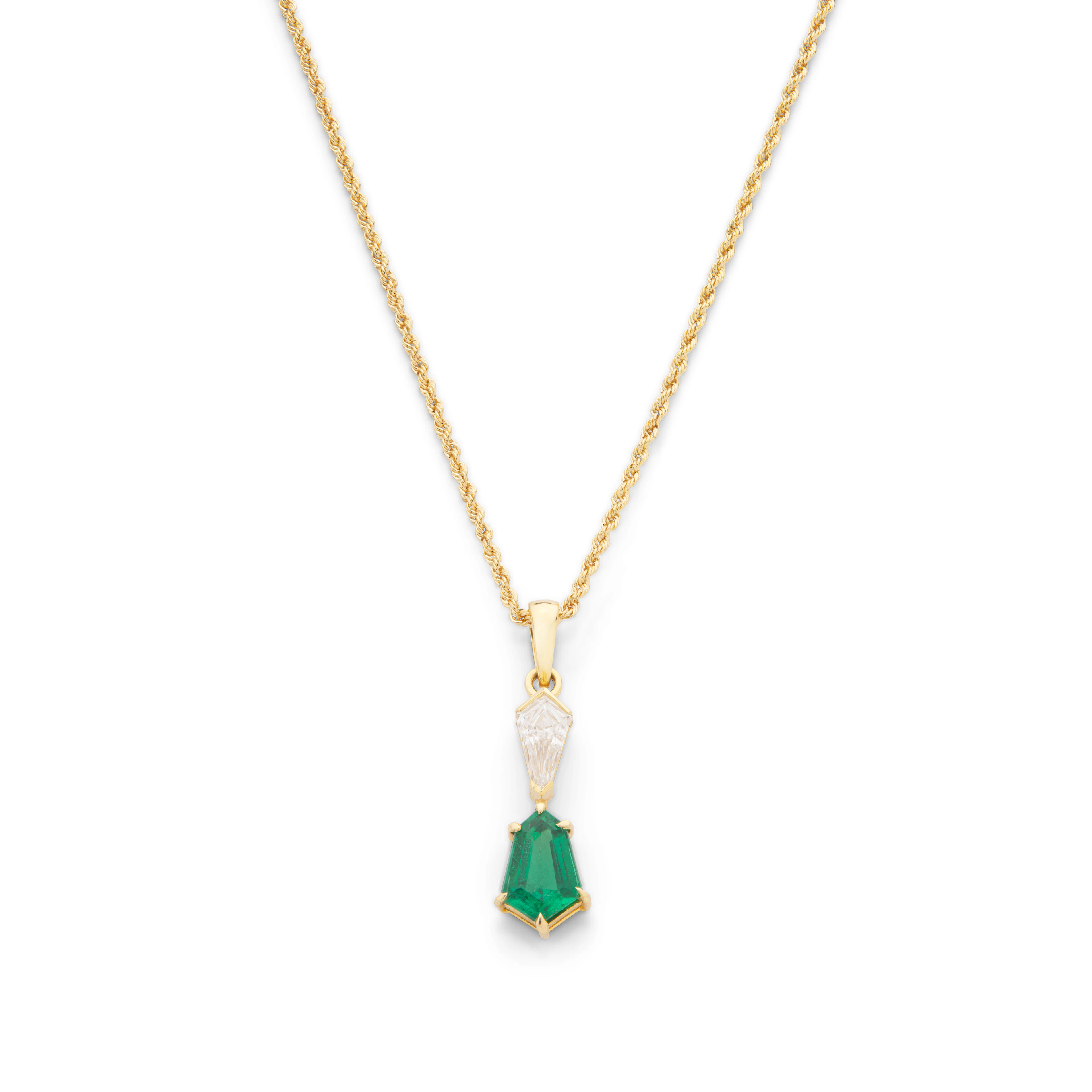 An emerald and diamond pendant necklace
