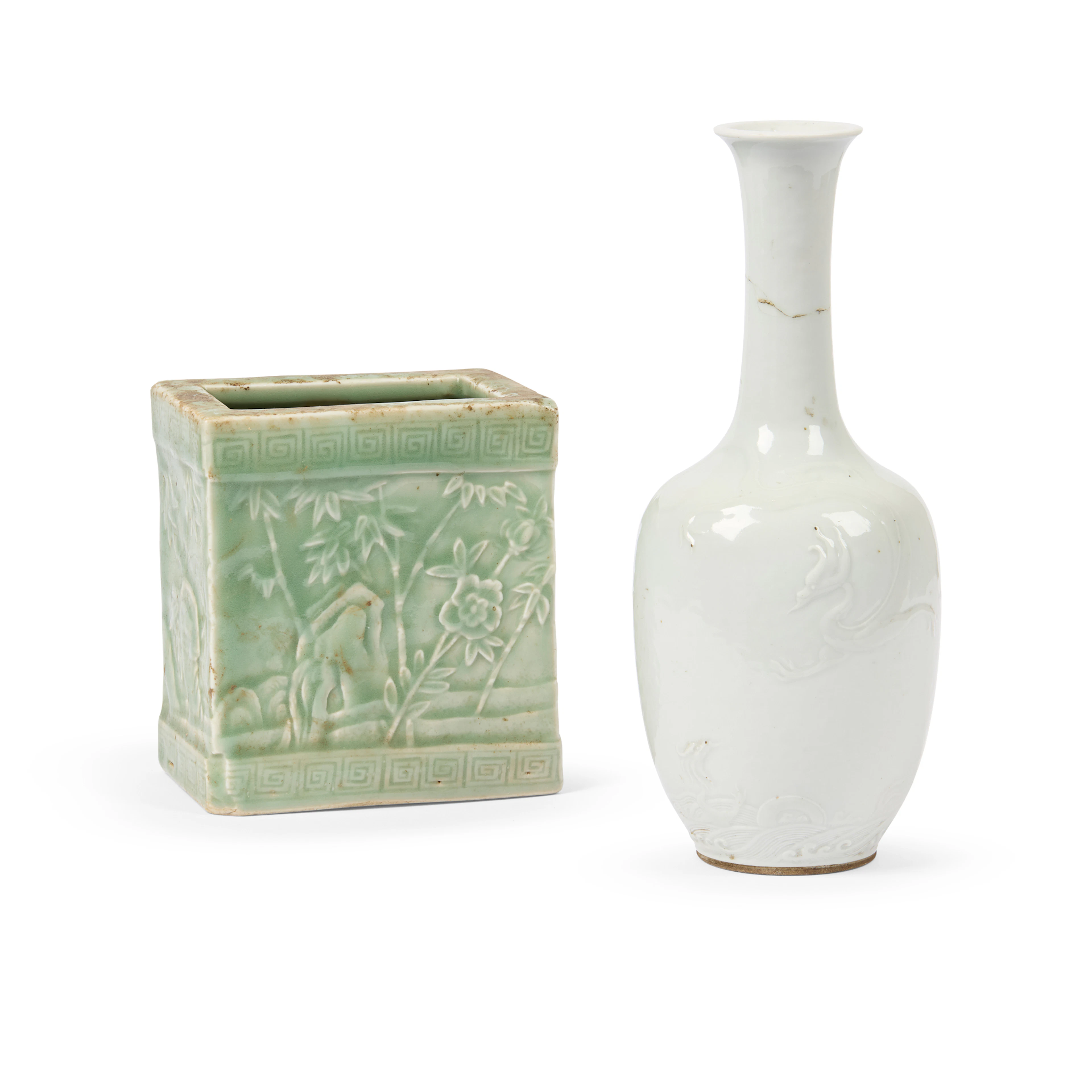 CHINESE CELADON-GLAZED BRUSH HOLDER AND A WHITE-GLAZED 'DRAGON' VASE