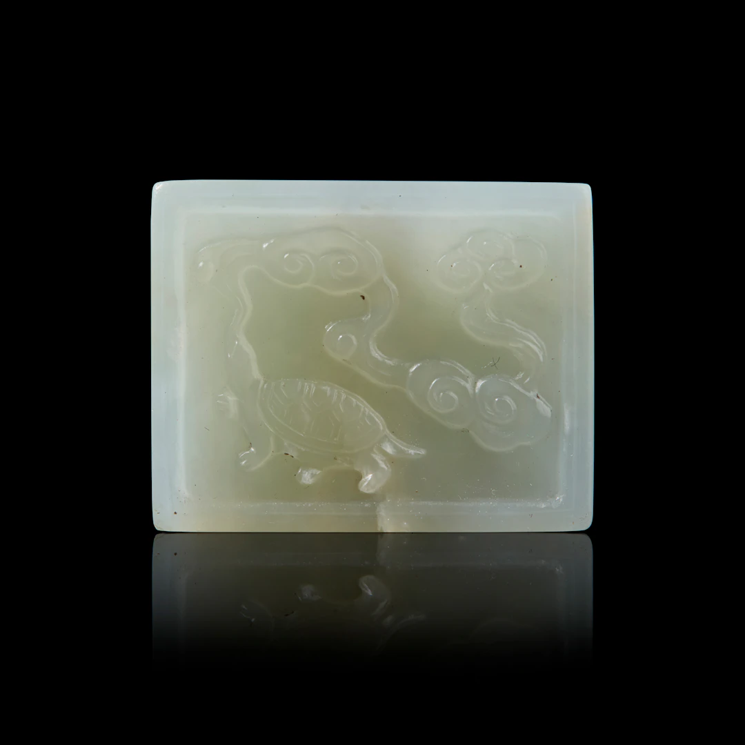 CHINESE WHITE JADE 'TORTOISE AND CRANE' RECTANGULAR PENDNAT