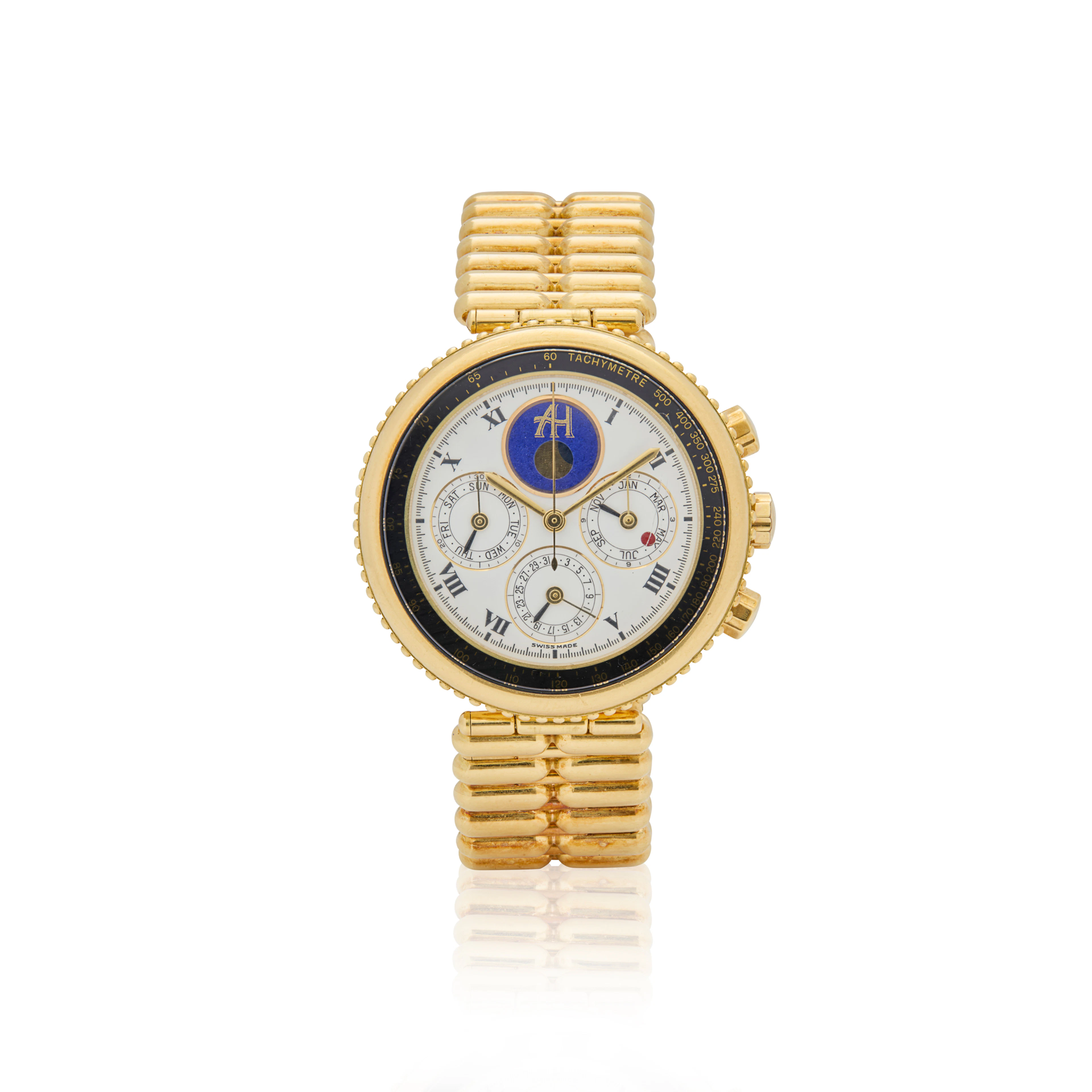 Gerald Genta. A rare 18k gold and lapis lazuli quartz perpetual calendar
