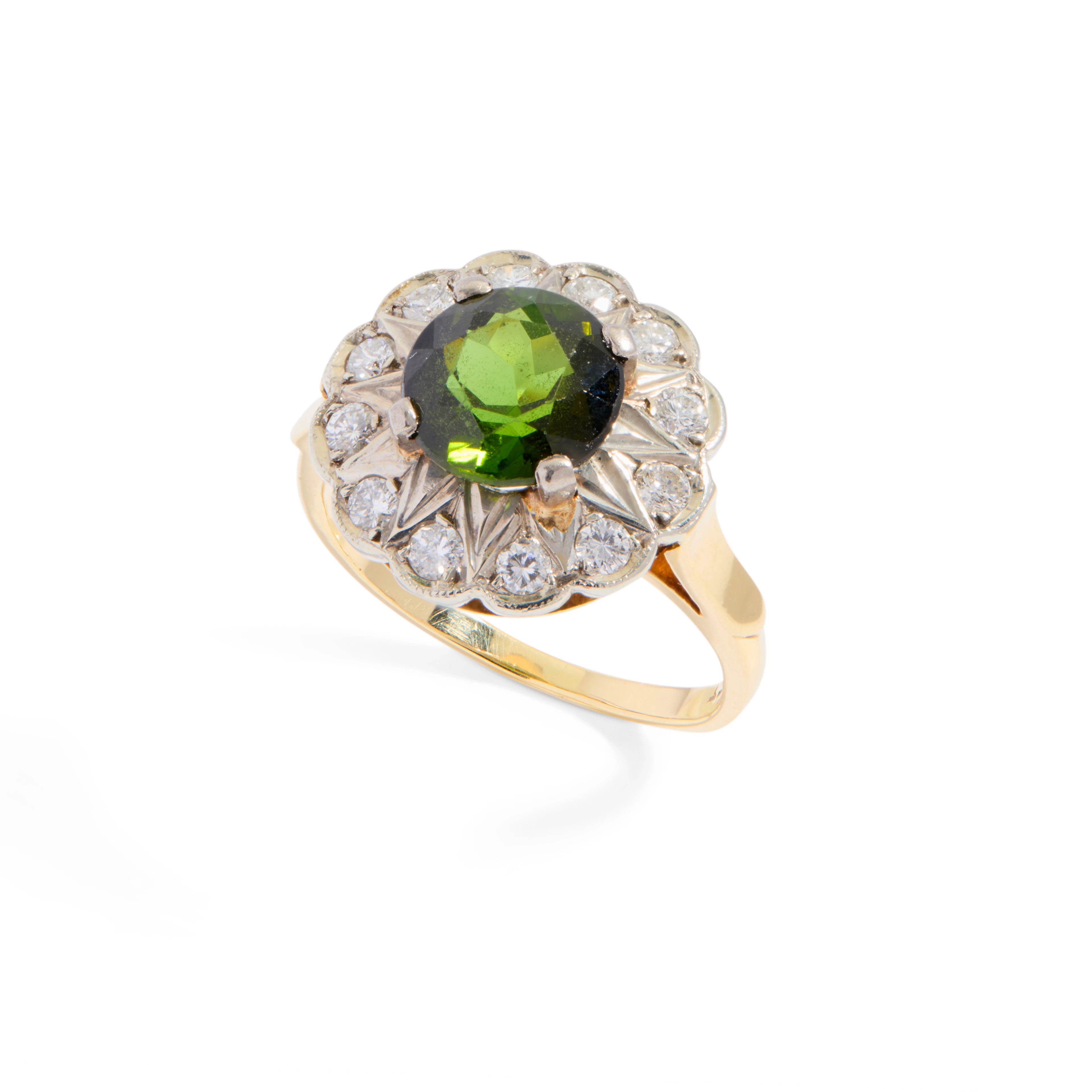 A green tourmaline and diamond cluster ring