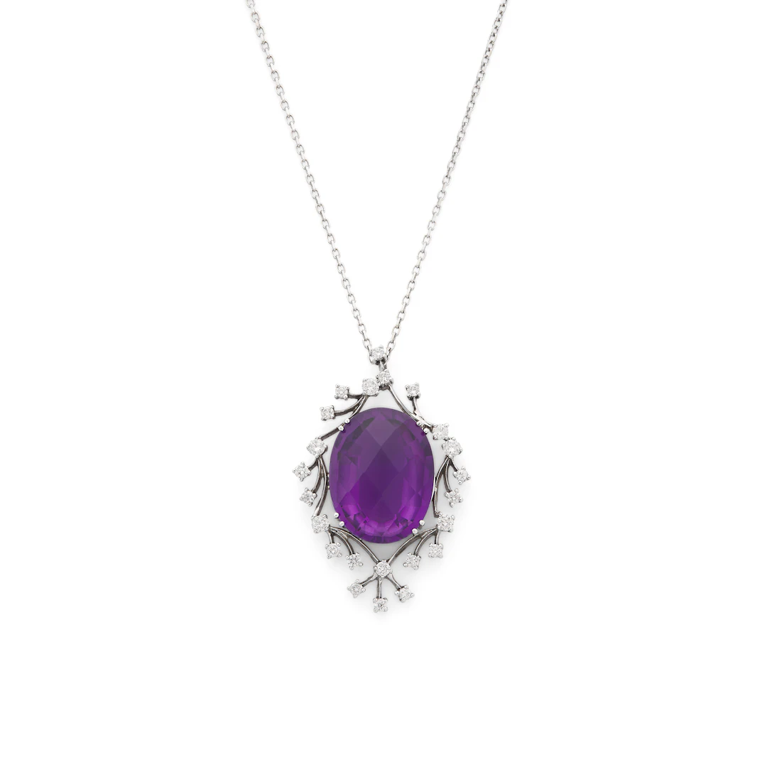 An amethyst and diamond pendent necklace