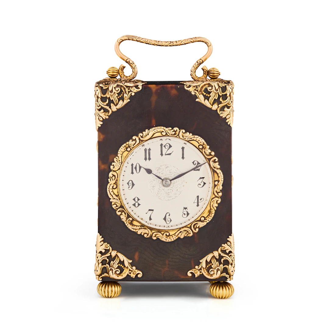 EDWARDIAN GILT METAL MOUNTED TORTOISESHELL CARRIAGE CLOCK