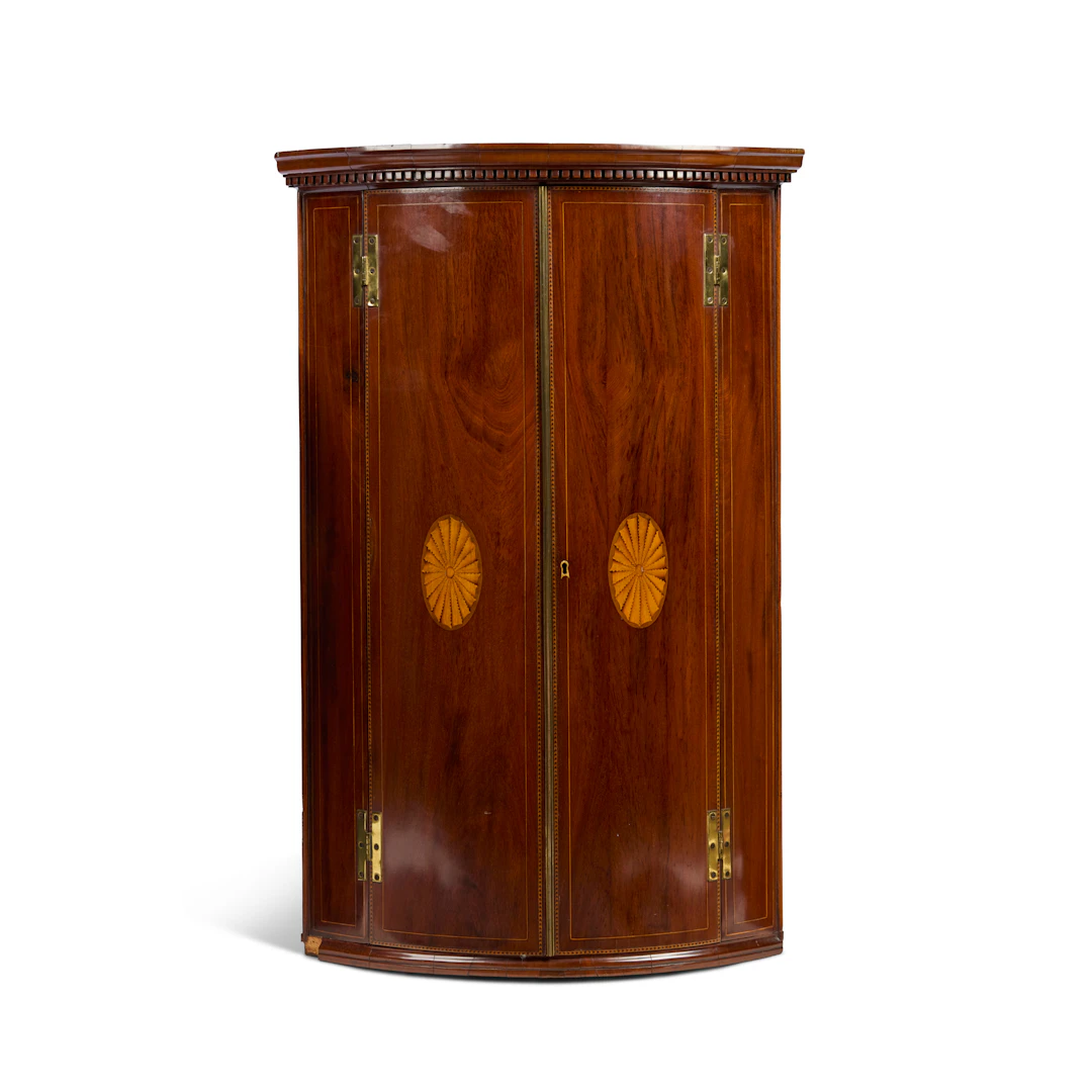 GEORGE III MAHOGANY BOWFRONT INLAID HANGING CORNER CABINET