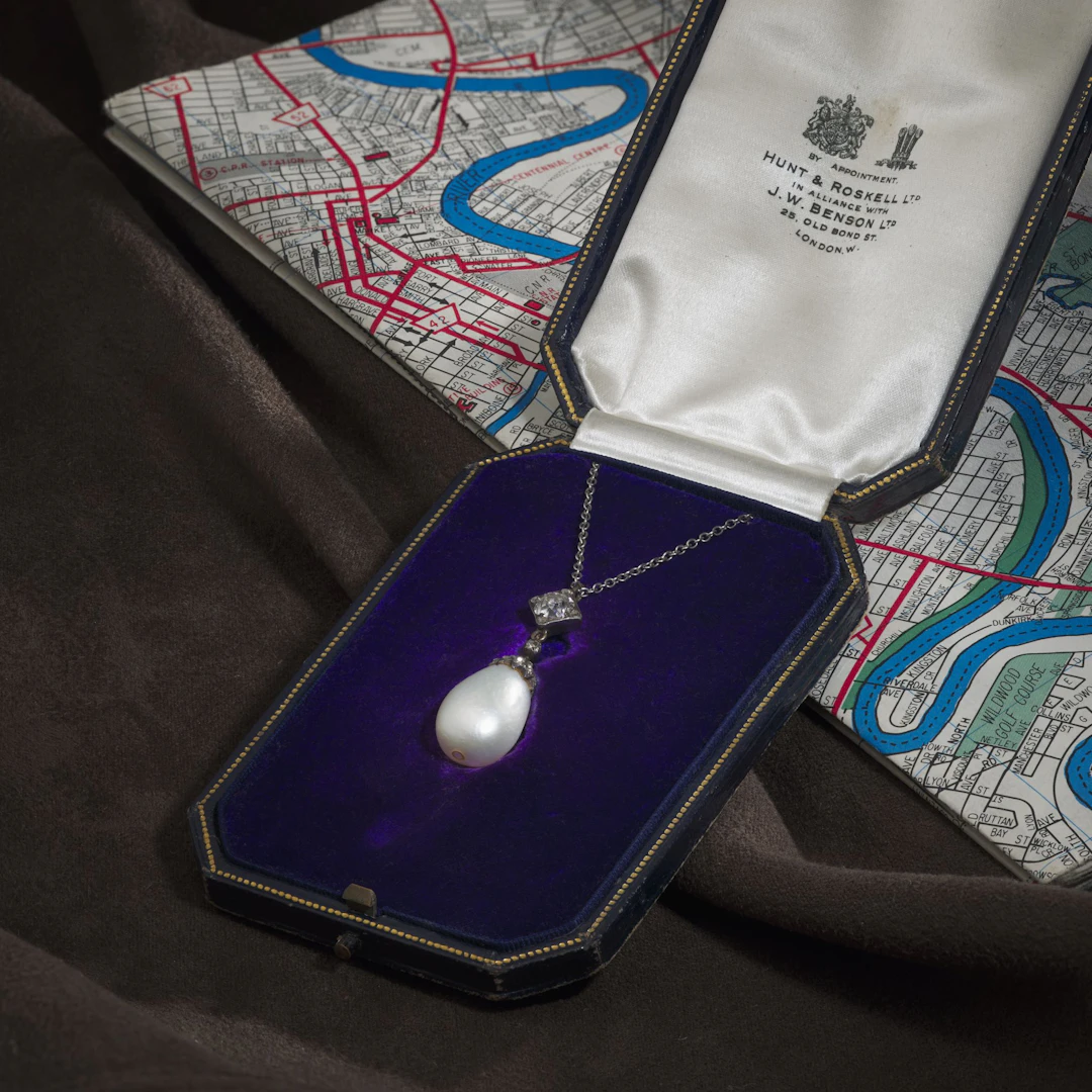 A natural pearl and diamond pendant