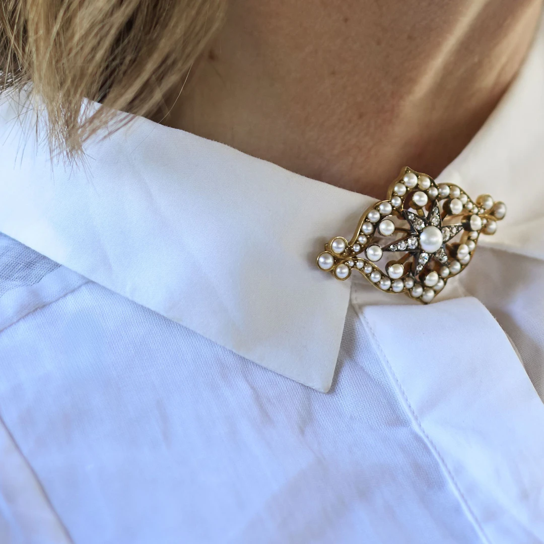 A pearl and diamond brooch, circa 1890