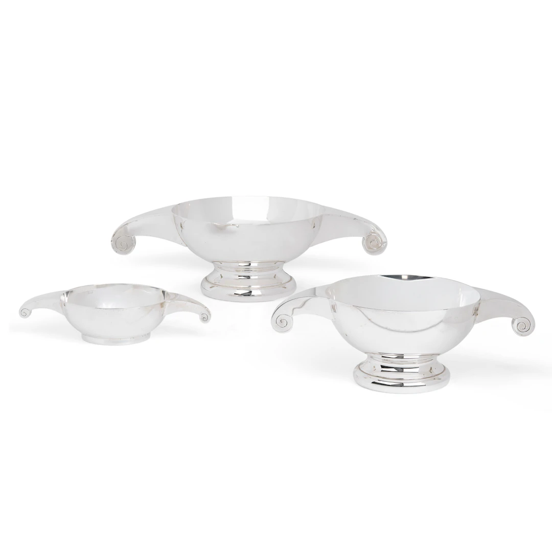 MATCHED SET OF THREE CONTEMPORARY SILVER GRADUATED SCROLL QUAICHS