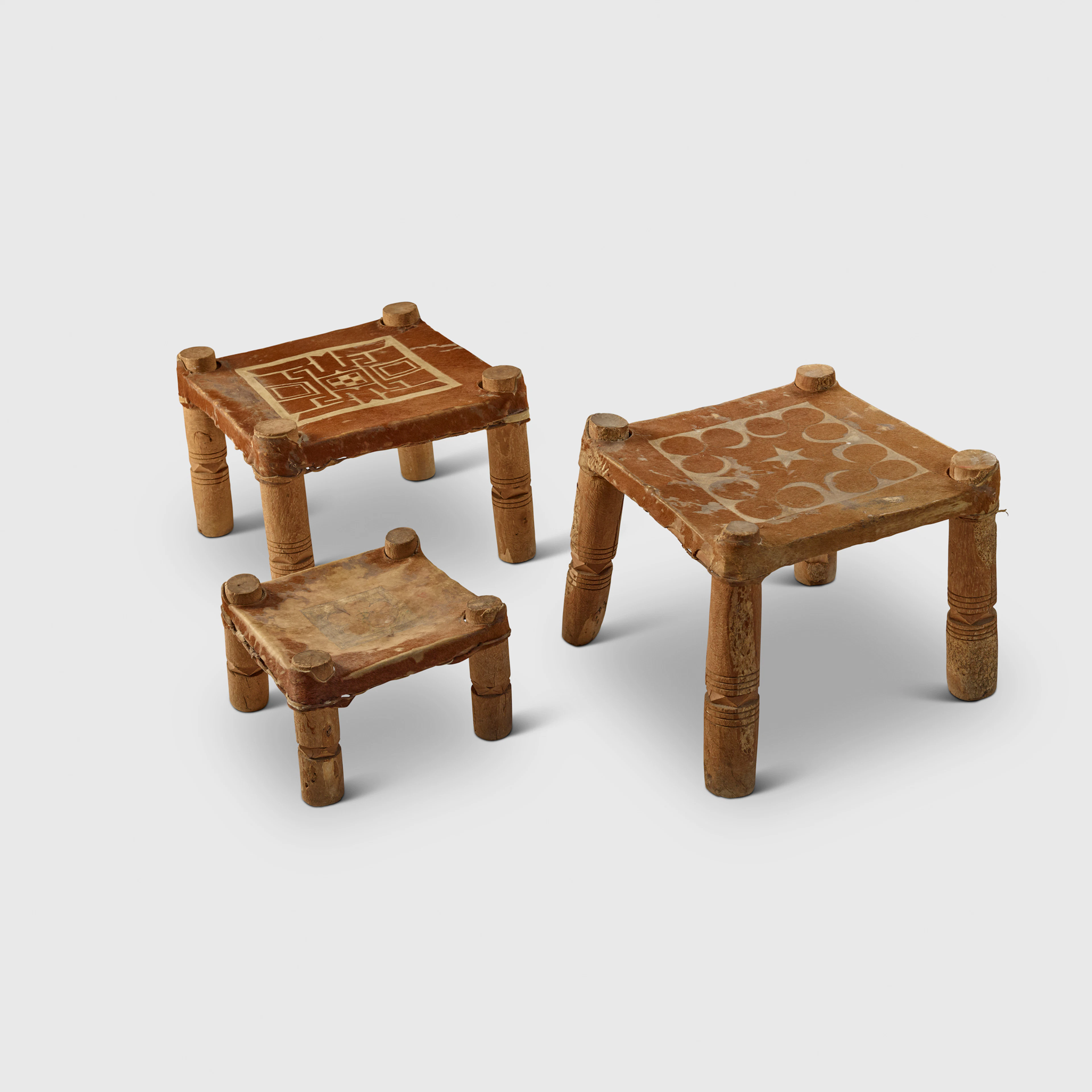 TRIO OF AFRICAN MILKING STOOLS