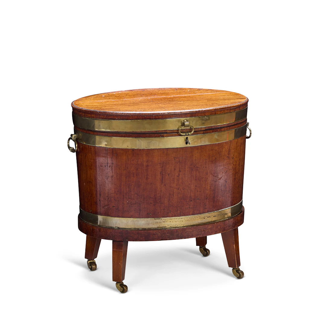 GEORGE III OVAL BRASS BANDED MAHOGANY CELLARETTE
