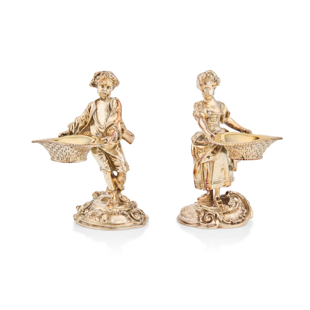 PAIR OF SILVER-PLATED FIGURAL SALT CELLARS OF A GARDENER AND COMPANION