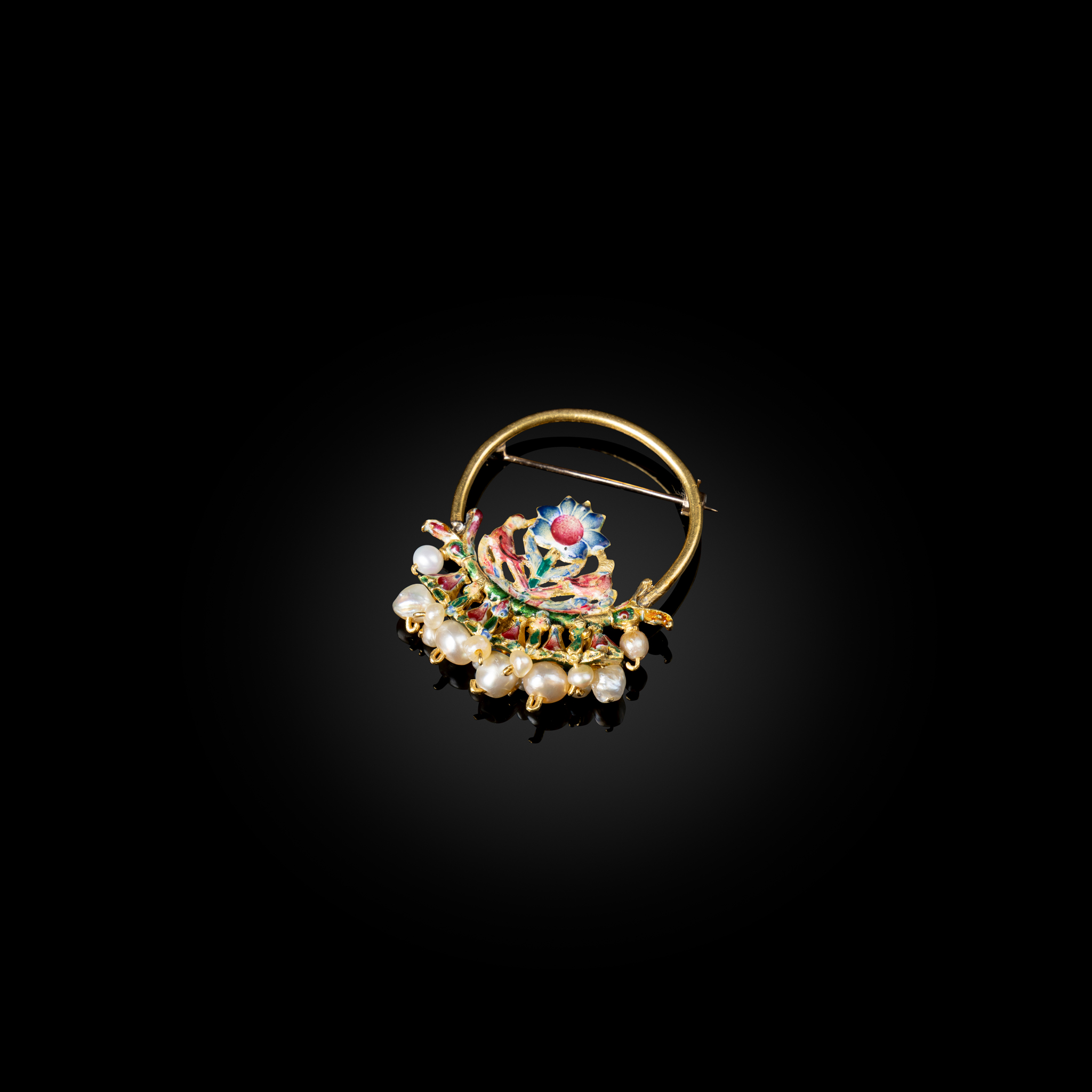 A QAJAR ENAMELLED GOLD BROOCH