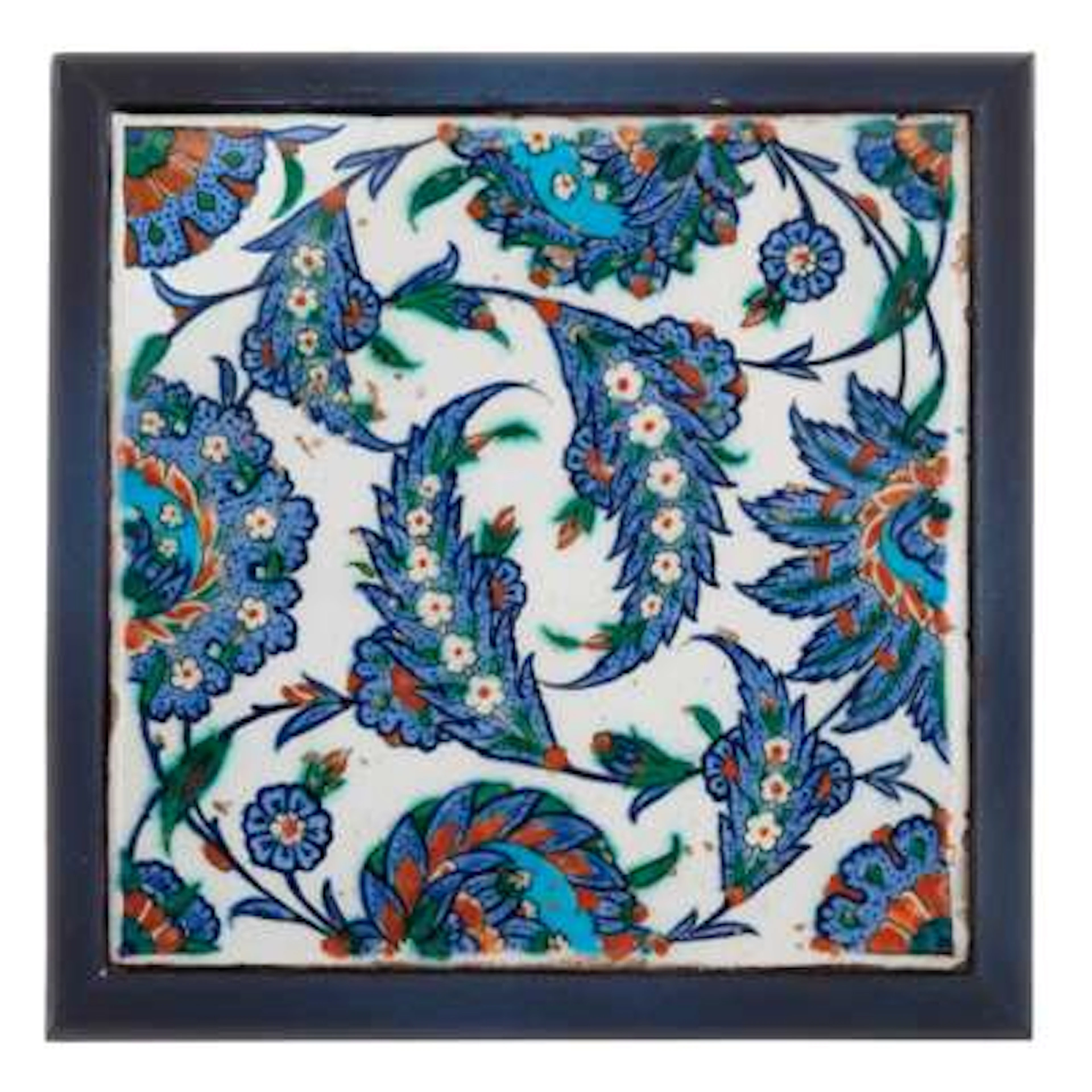 A IZNIK POTTERY TILE DECORATED WITH 'SAZ' LEAVES
