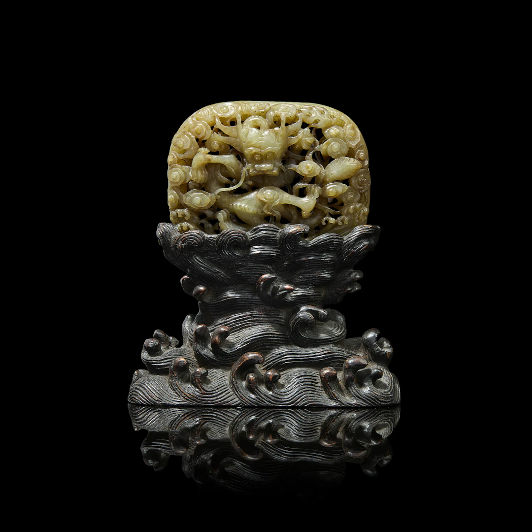 [COLLECTION OF A BRITISH FAMILY] CHINESE WHITE JADE WITH RUSSET INCLUSIONS