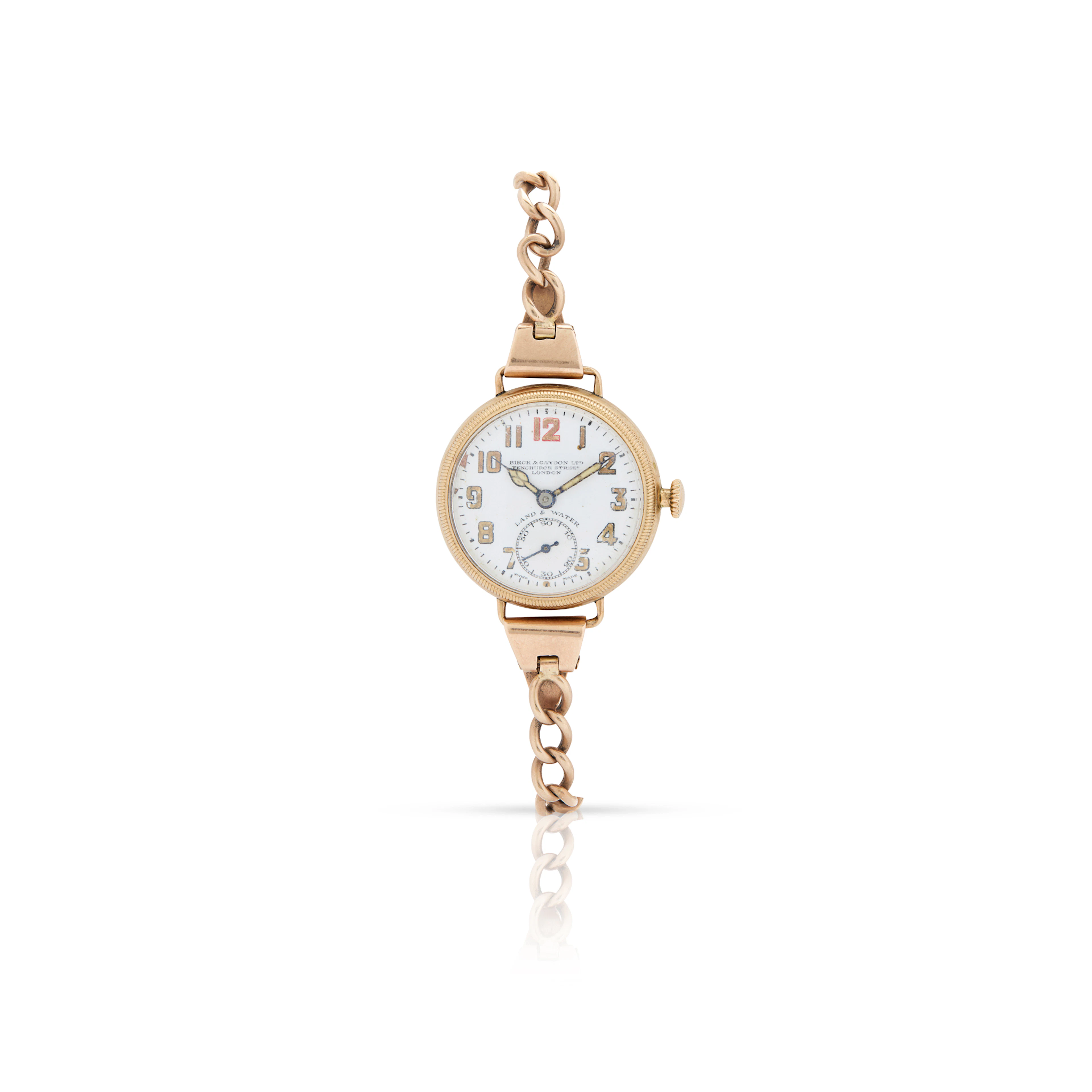 Zenith, retailed by Birch & Gaydon Ltd. London. An unusual 9k gold