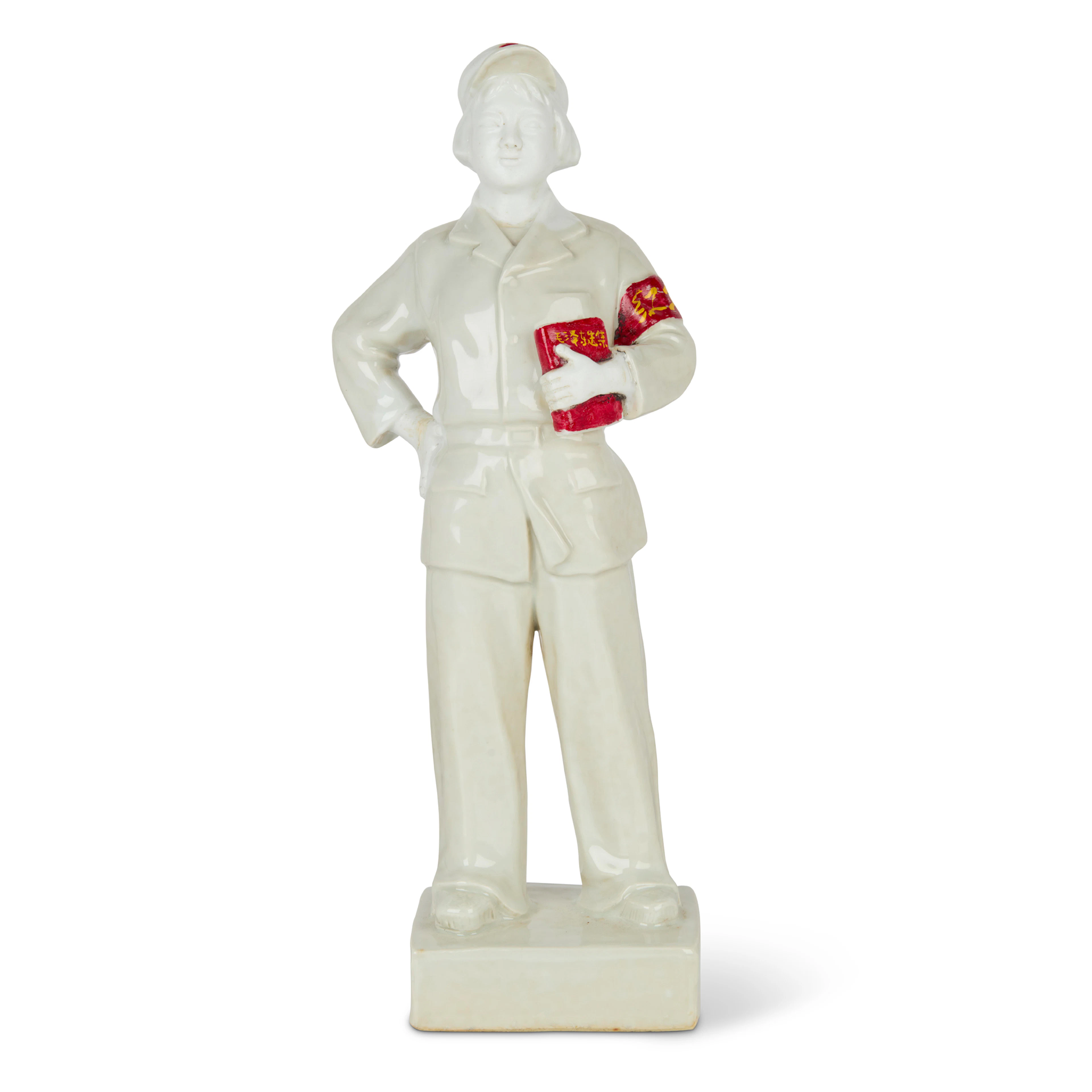 CHINESE WHITE-GLAZED FIGURE OF A FEMALE RED GUARD