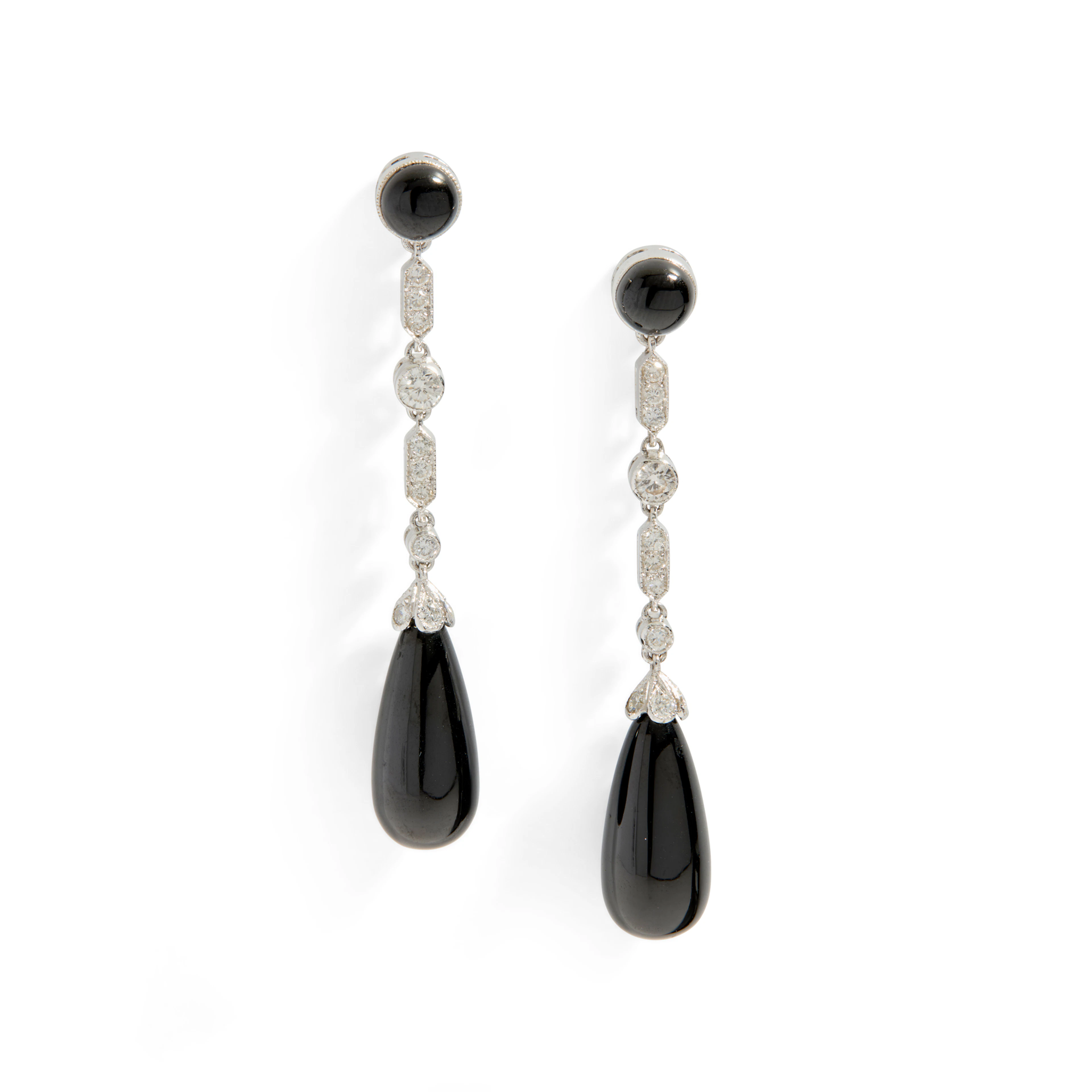 A pair of onyx and diamond pendent earrings