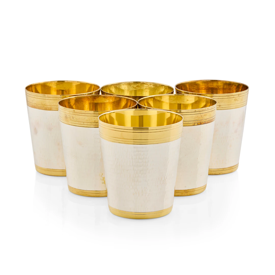 SET OF SIX CONTEMPORARY SILVER PARCEL GILT PLANISHED BEAKERS