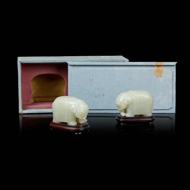 PAIR OF CHINESE WHITE JADE 'ELEPHANT' CARVINGS
