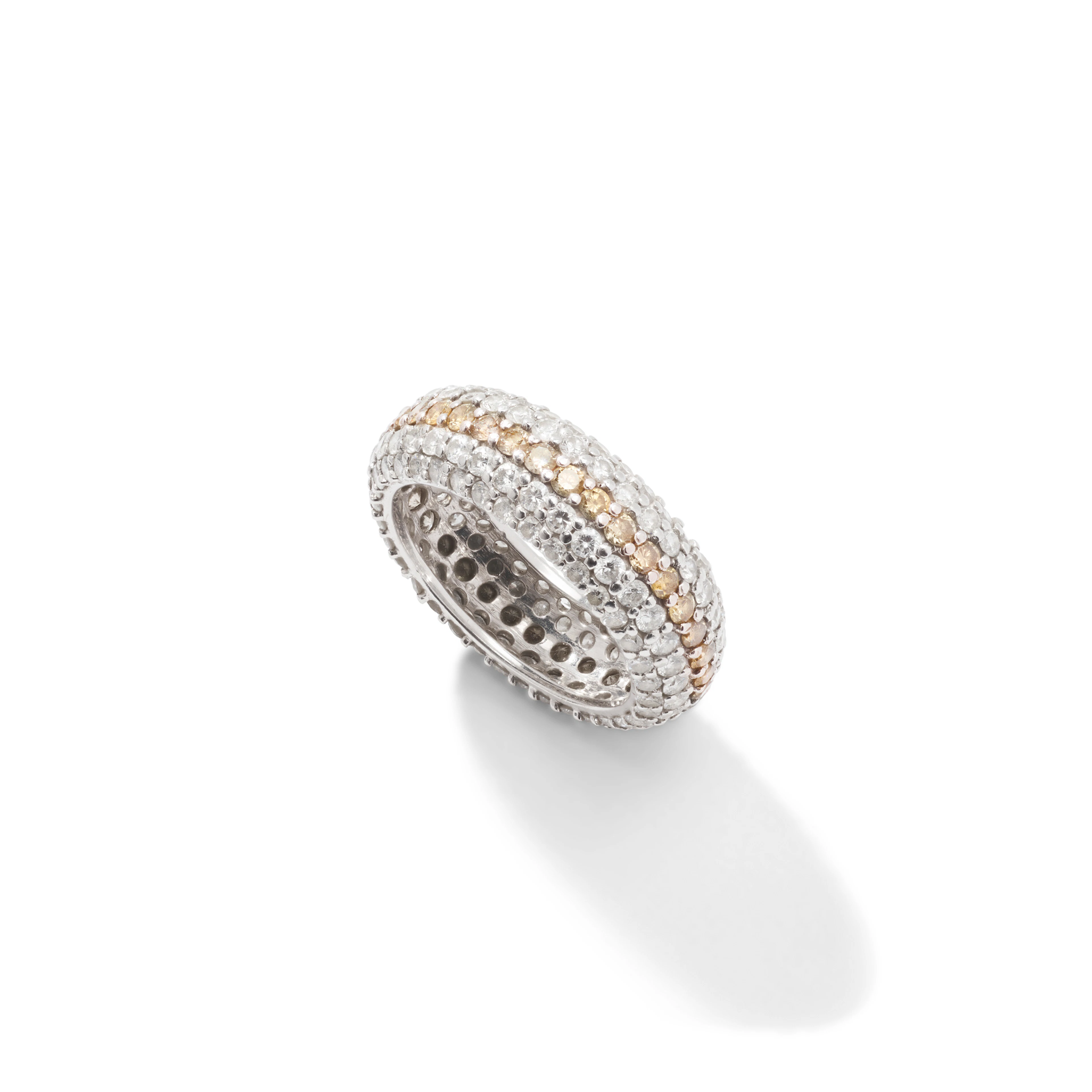A champagne and colourless diamond eternity ring
