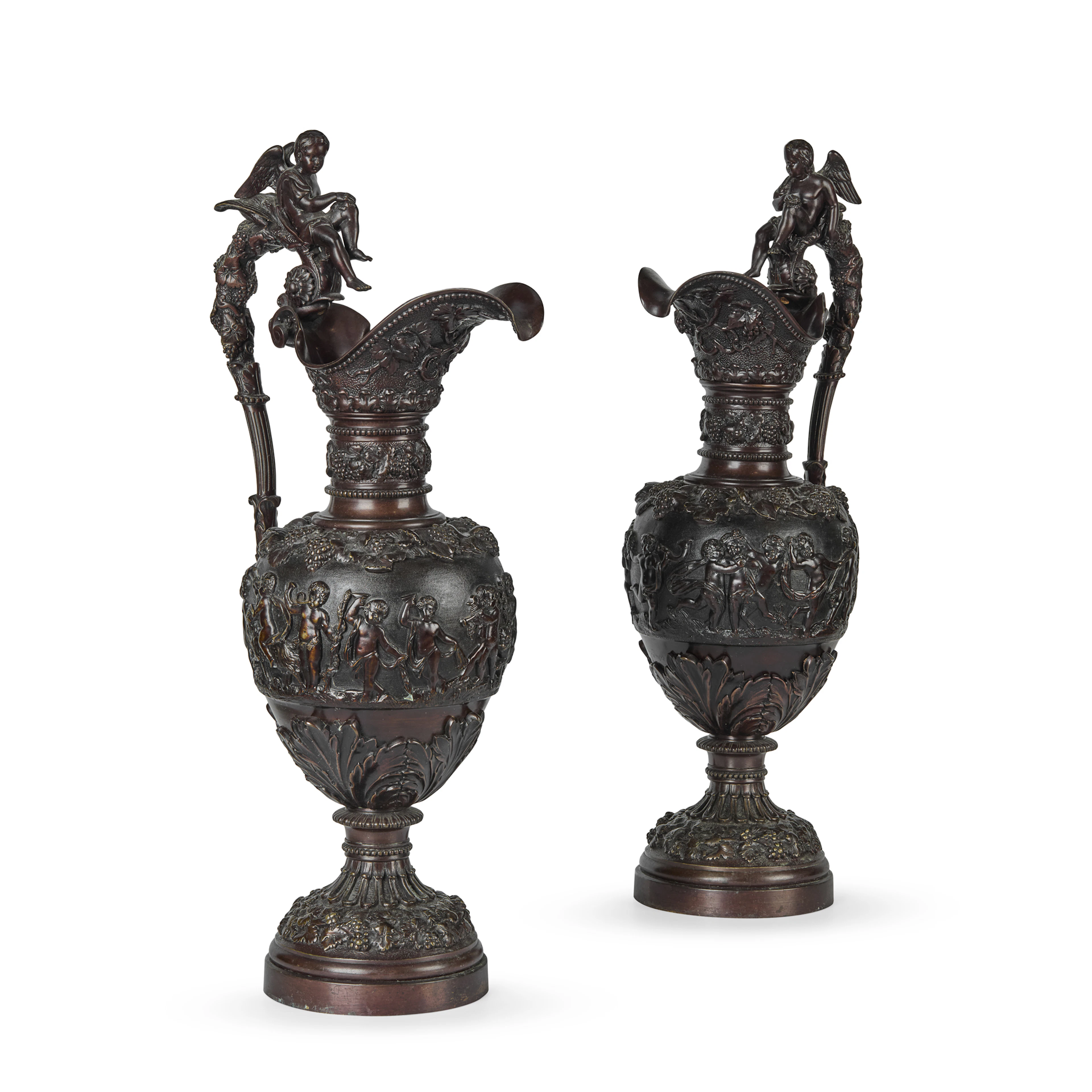 A PAIR OF FRENCH BRONZE EWERS IN THE MANNER OF CLAUDE-MICHEL CLODION