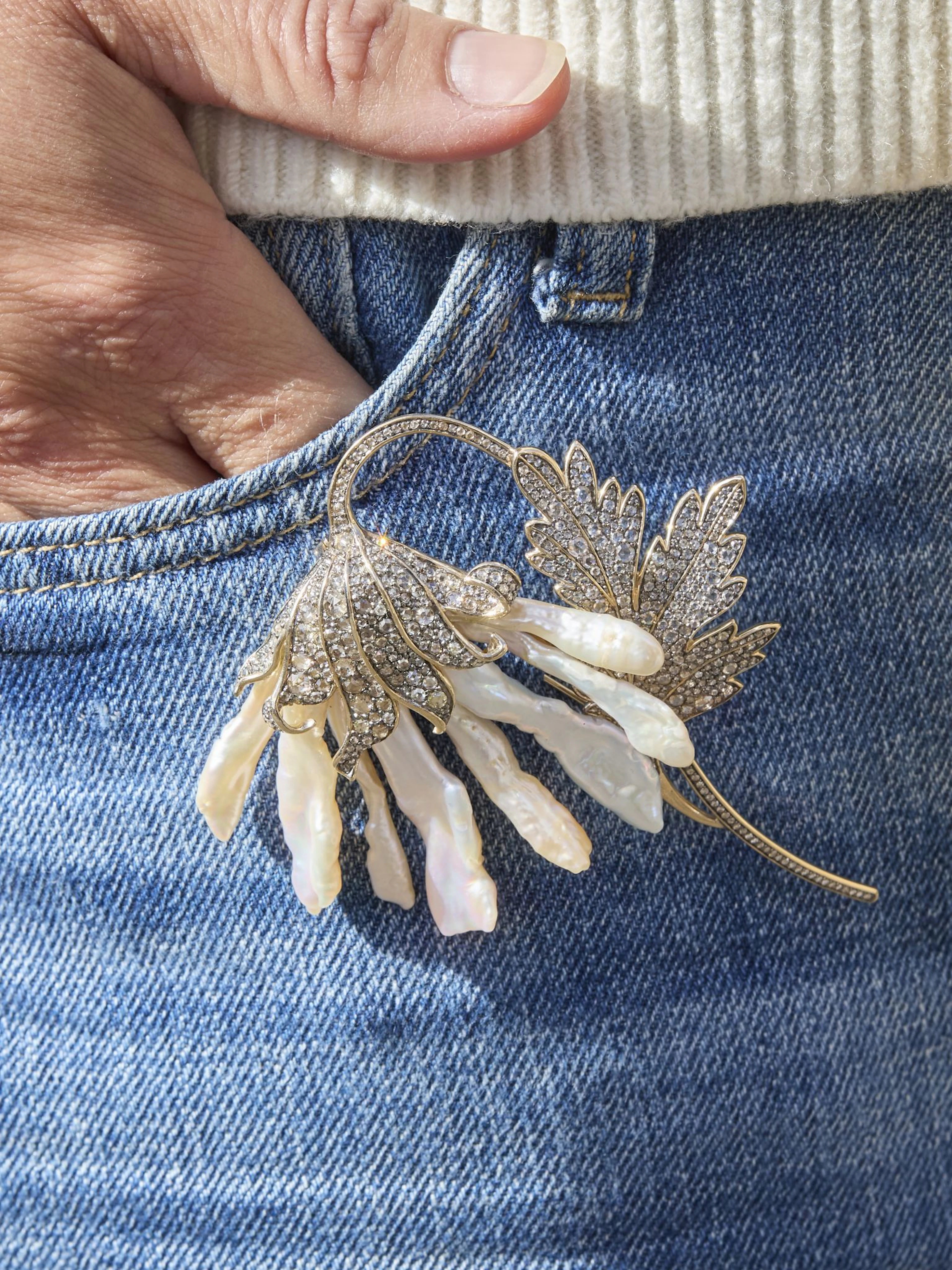 Fei Liu: A blister pearl and diamond floral brooch