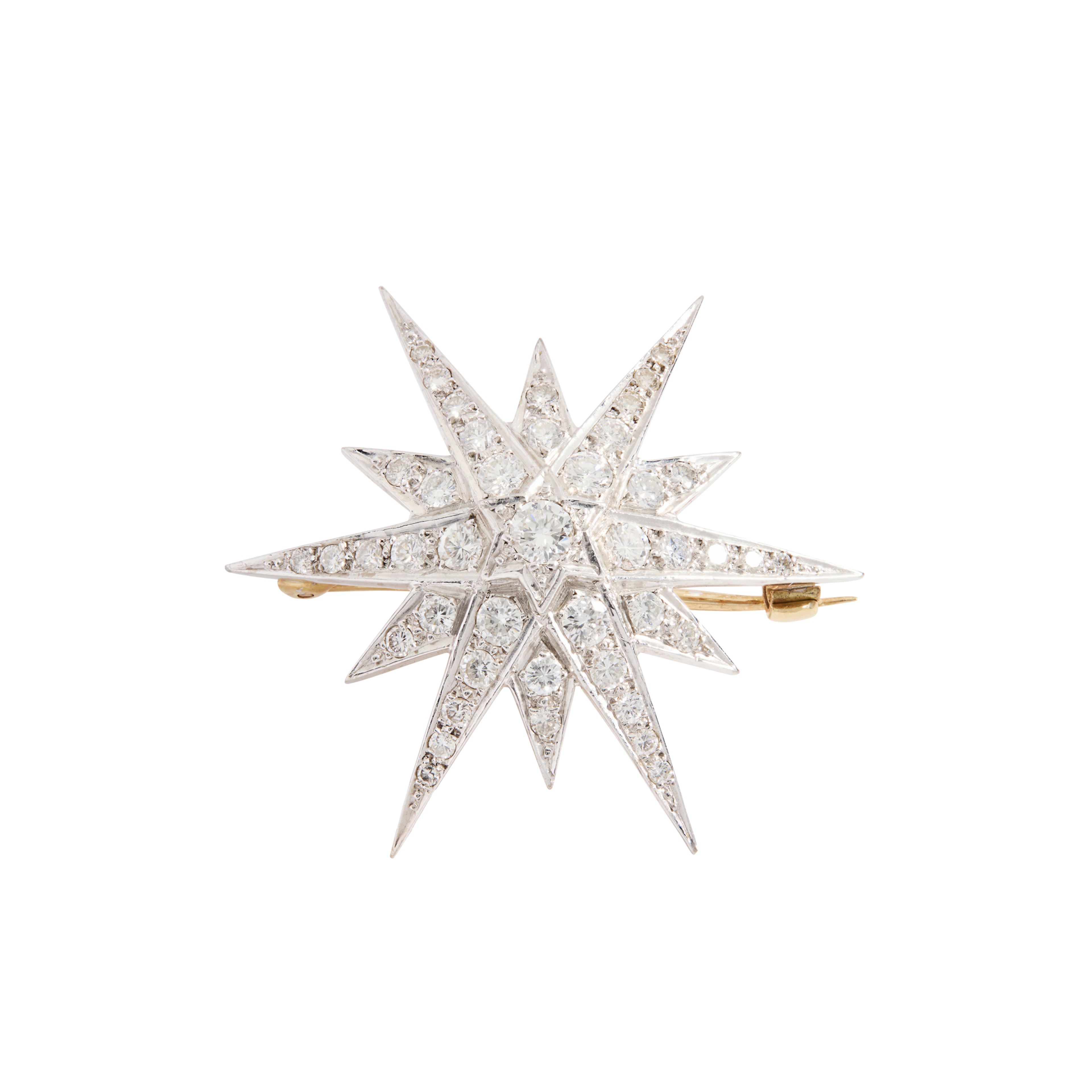 An 18ct gold diamond star brooch