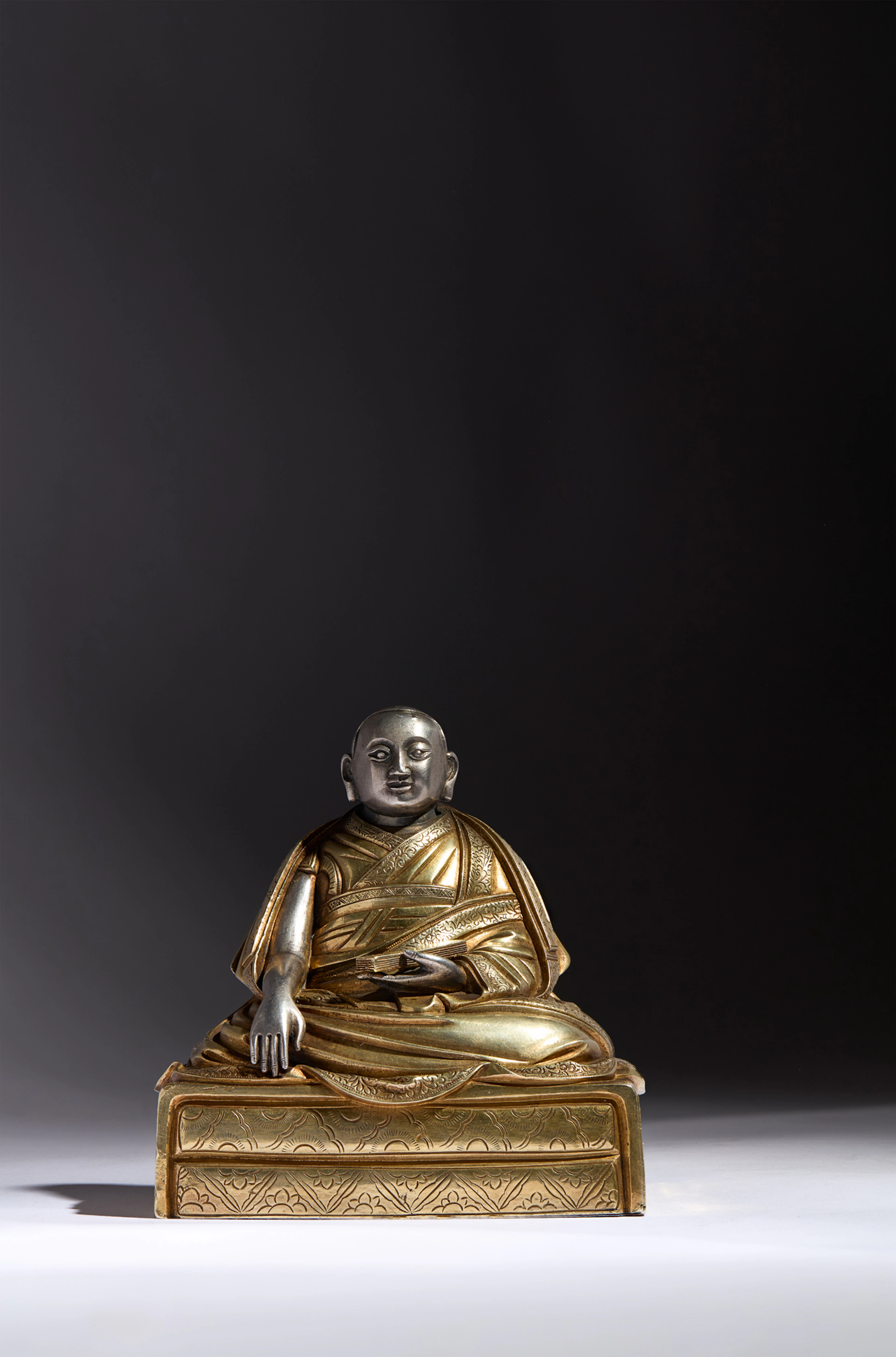 SINO-TIBETAN PARCEL-GILT SILVER FIGURE OF NGAWANG LOBSANG GYATSO