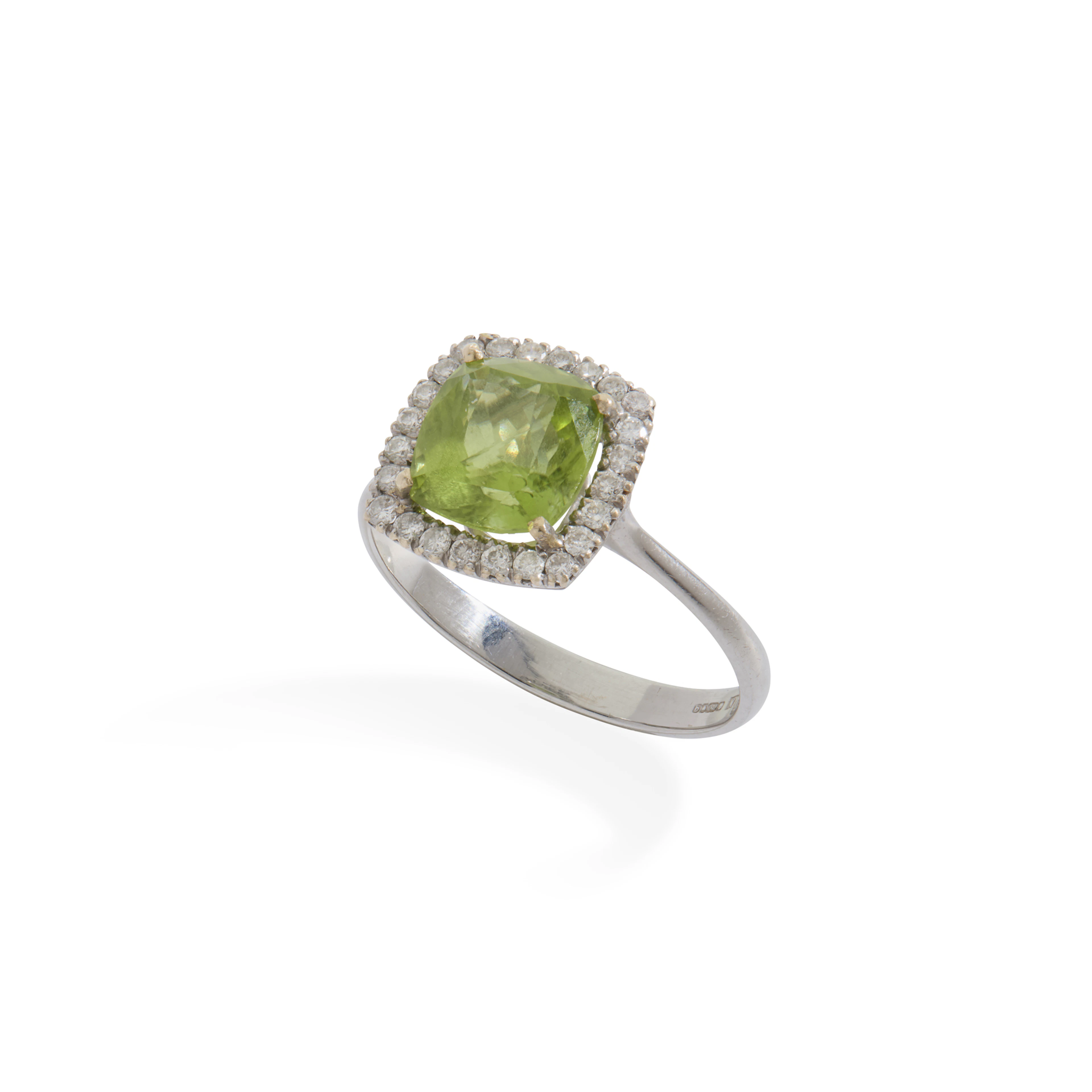 A peridot and diamond cluster ring