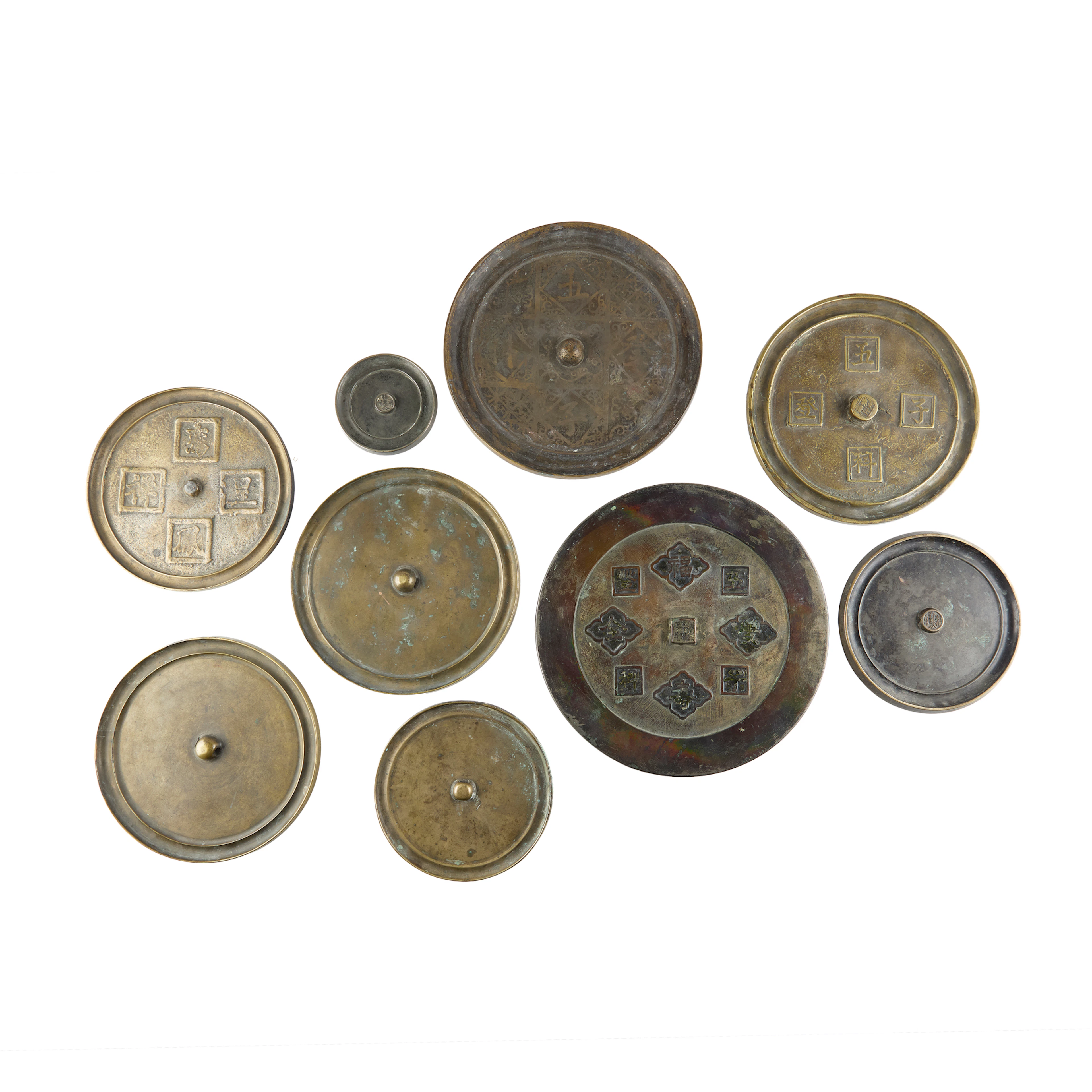 GROUP OF NINE CHINESE BRONZE CIRCULAR MIRRORS