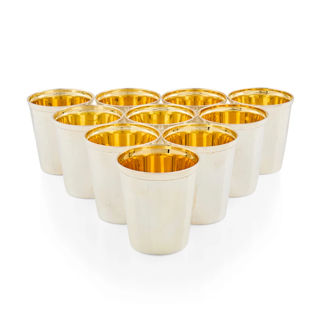 SET OF TEN MATCHED CONTEMPORARY SILVER PLANISHED BEAKERS