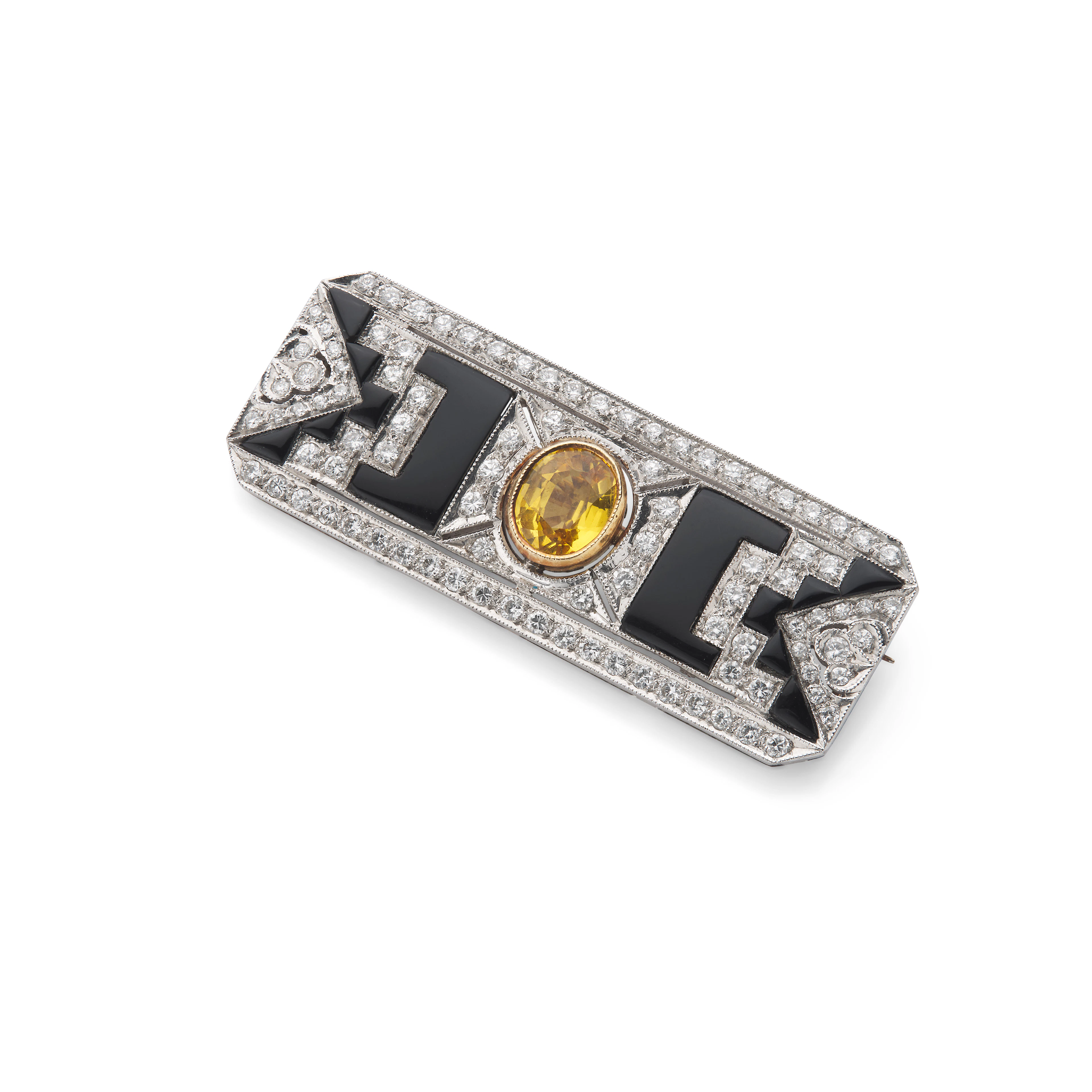 A yellow sapphire, onyx and diamond brooch