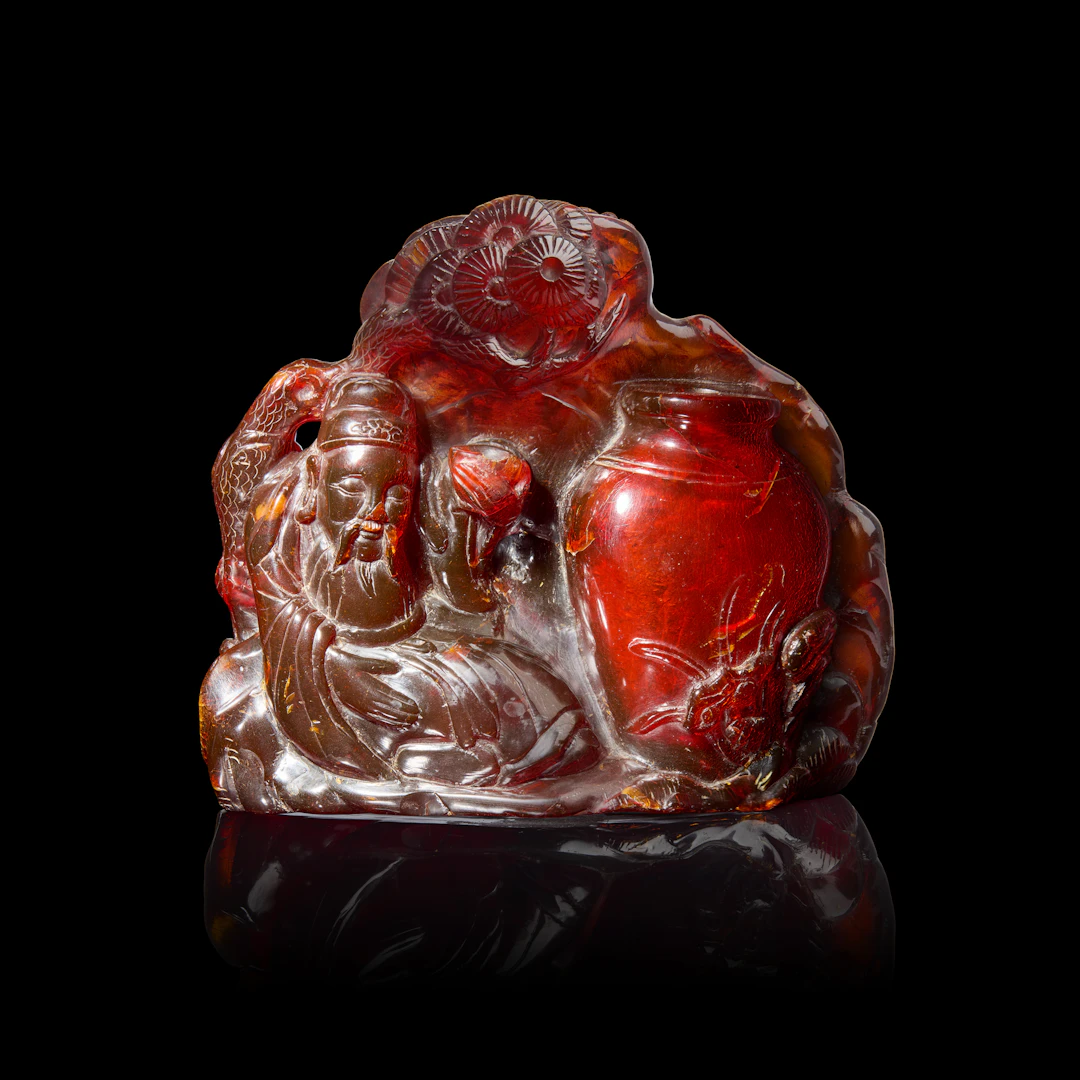 LARGE CHINESE AMBER CARVING OF DRINKING LIBAI