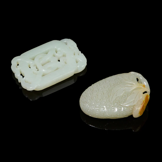 TWO CHINESE WHITE JADE PENDANTS